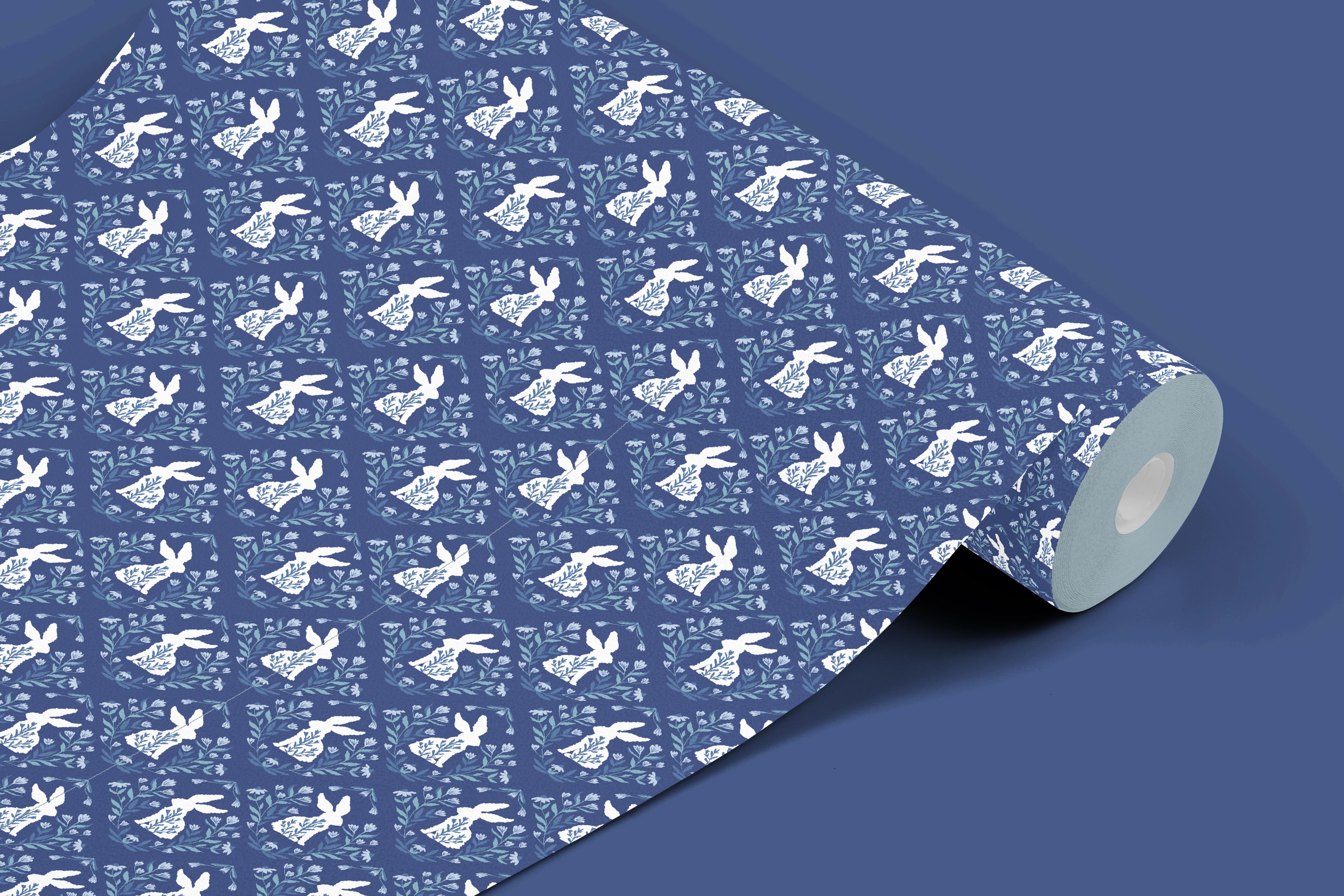 Contact Paper 1100: Elegant blue rabbit contact paper featuring hand-drawn white bunnies, floral accents, and a vintage folk-inspired motif on a deep navy background.