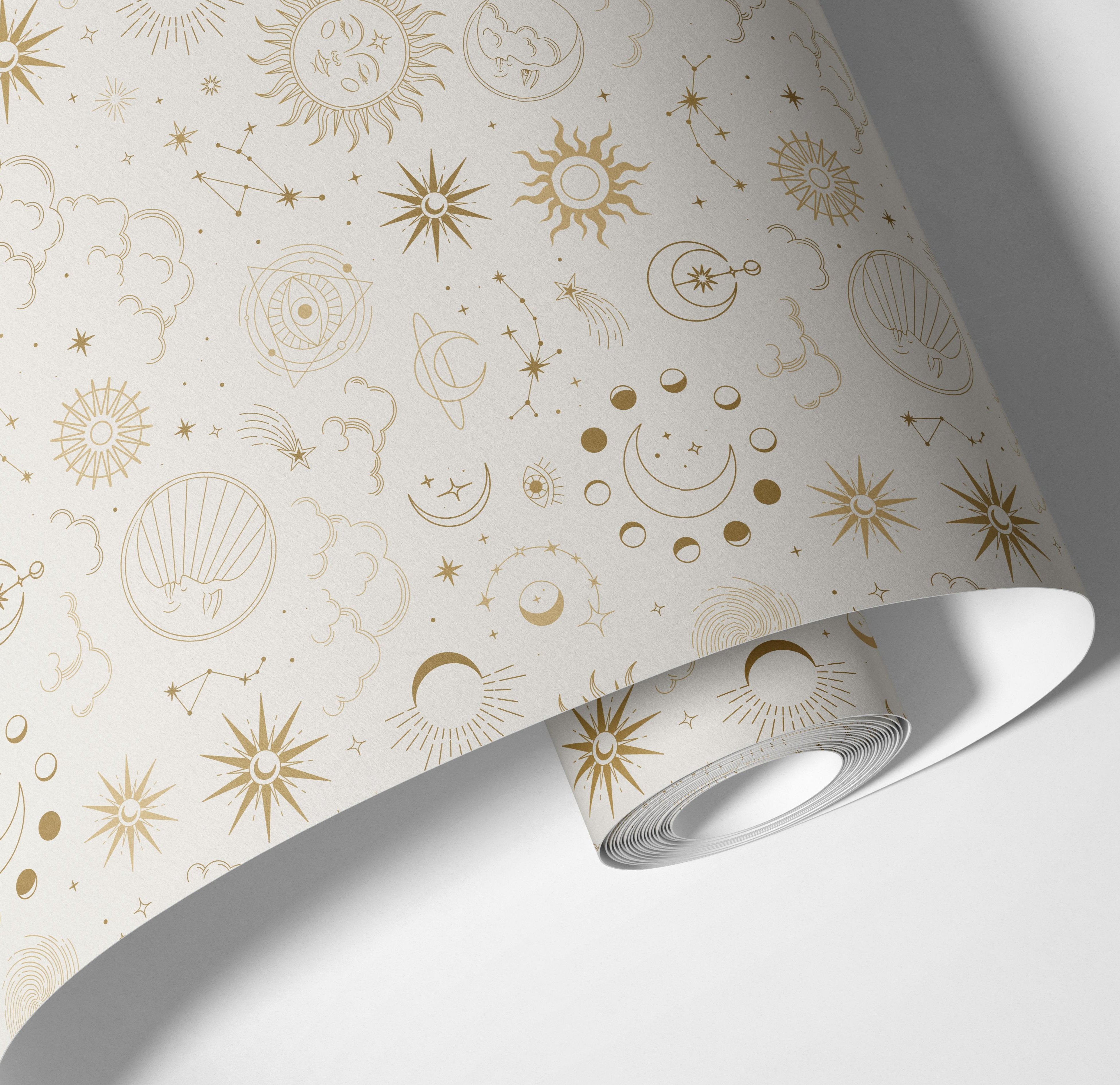 Contact paper 1138: A celestial-themed contact paper featuring gold astrology symbols, suns, moons, constellations, and cosmic elements on a soft neutral background. Ideal for adding a mystical and elegant touch to walls, furniture, or accent spaces.