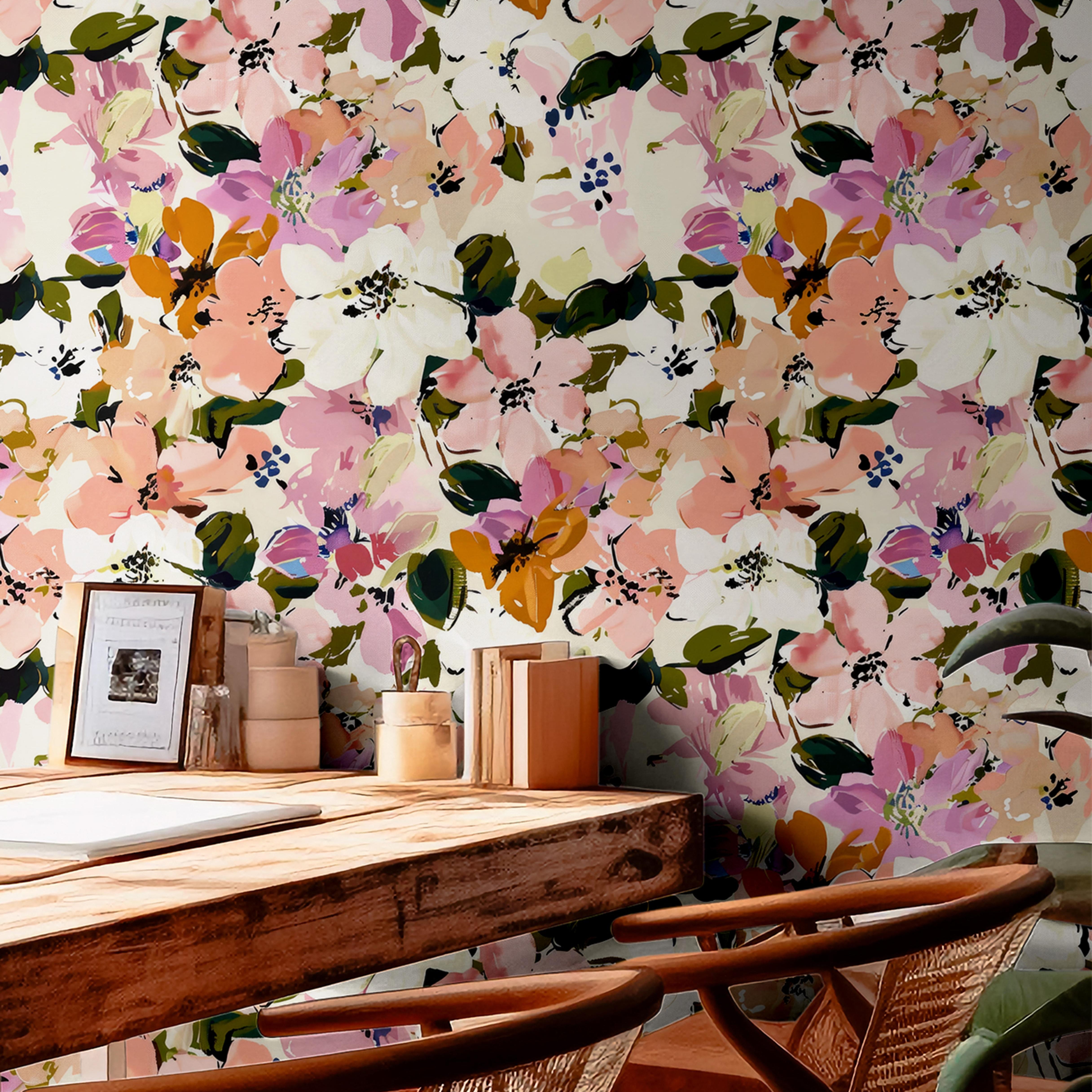 Overlapping pink , yellow, orange, white, and cream flowers as a wallpaper design.