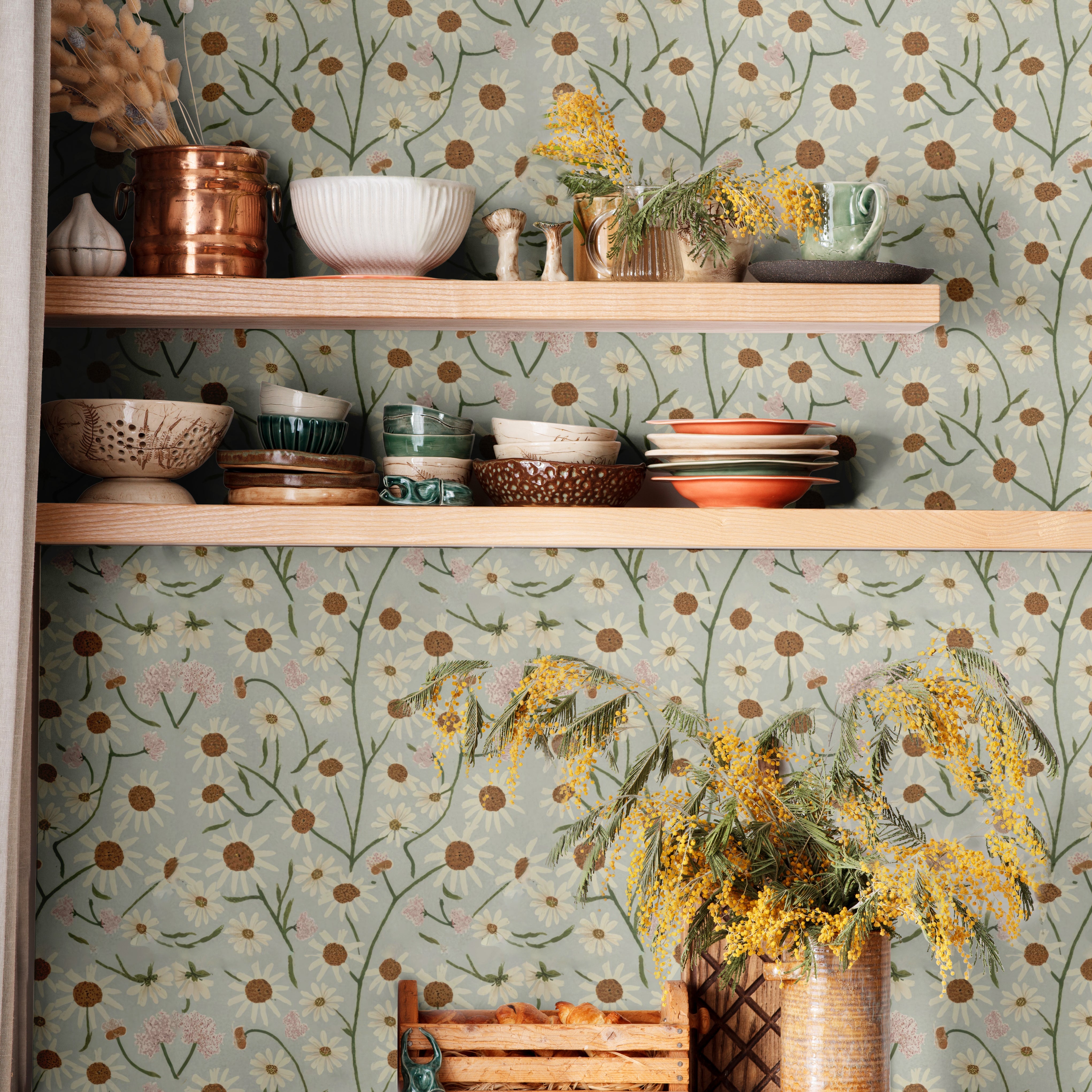 Small white and pink flowers on a light gray background.