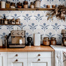 Wallpaper 1632 pattern of repeating deco style dandelions on a cream background.