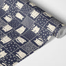 Contact paper 1823: A navy blue contact paper featuring a whimsical grid of white cat illustrations, each set against a unique geometric background, creating a playful and modern aesthetic.