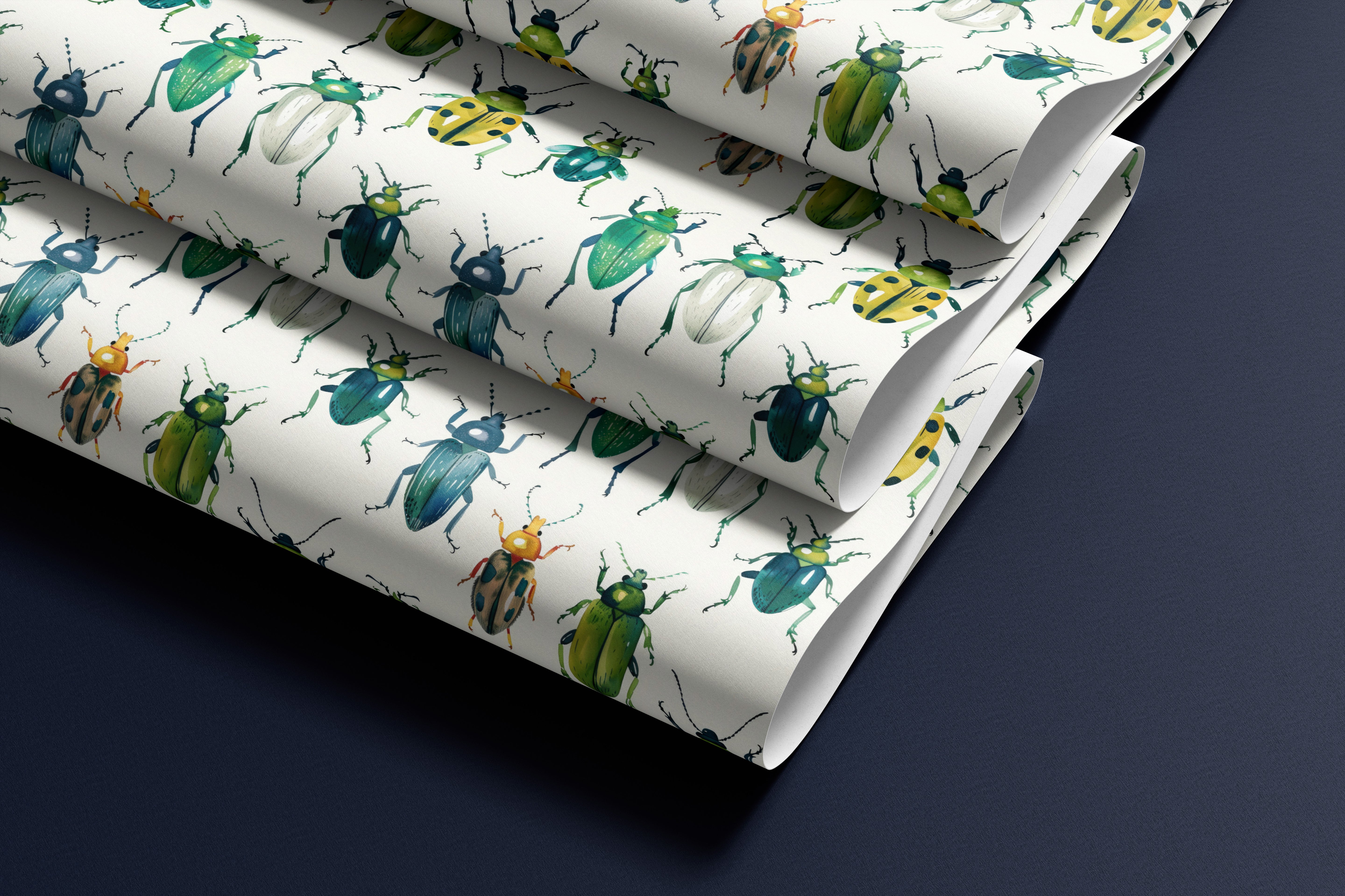 Contact paper 1856: Folded contact paper with a cream background featuring colorful hand-painted beetles in shades of green, blue, yellow, and orange, arranged in a playful, repeating pattern.