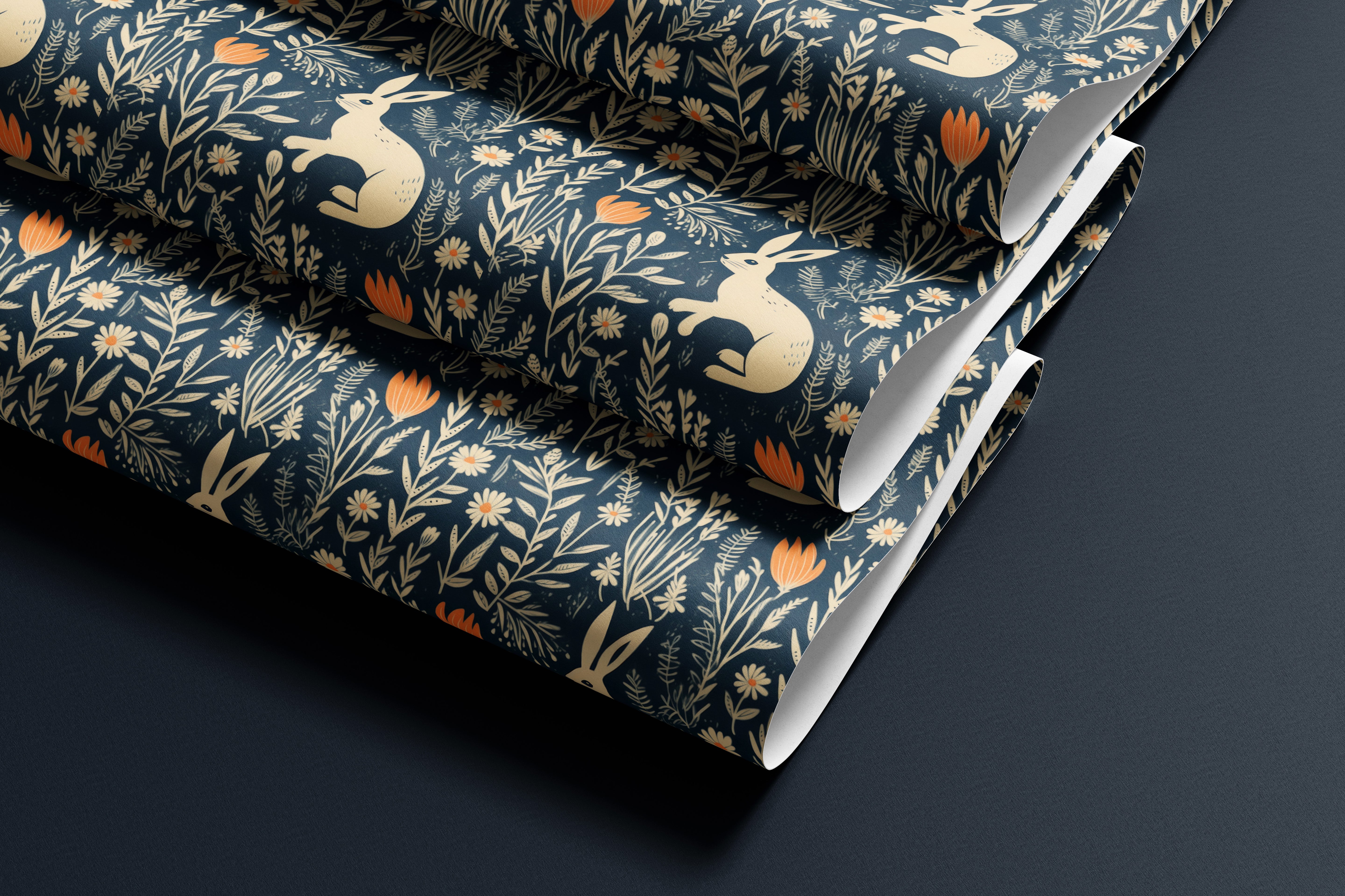 Contact paper 1858: Folded contact paper with a dark navy background featuring whimsical cream-colored rabbits, orange tulips, and scattered botanical elements in a woodland-inspired design.