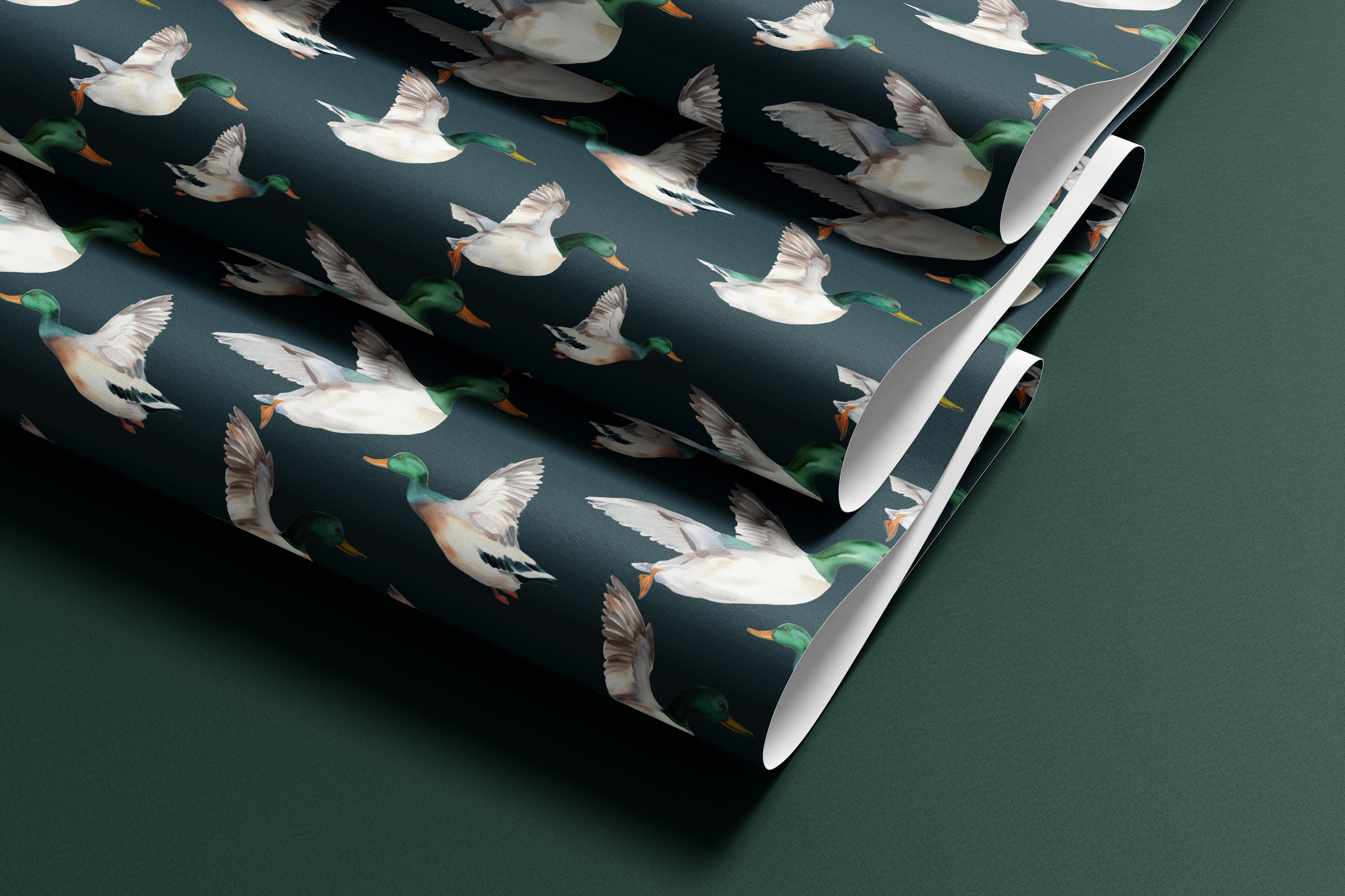 Contact paper 1862: "A roll of dark green contact paper featuring a realistic pattern of flying mallard ducks in shades of green, brown, and white, creating a rustic and outdoorsy aesthetic.
