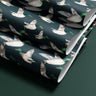 Contact paper 1862: "A roll of dark green contact paper featuring a realistic pattern of flying mallard ducks in shades of green, brown, and white, creating a rustic and outdoorsy aesthetic.