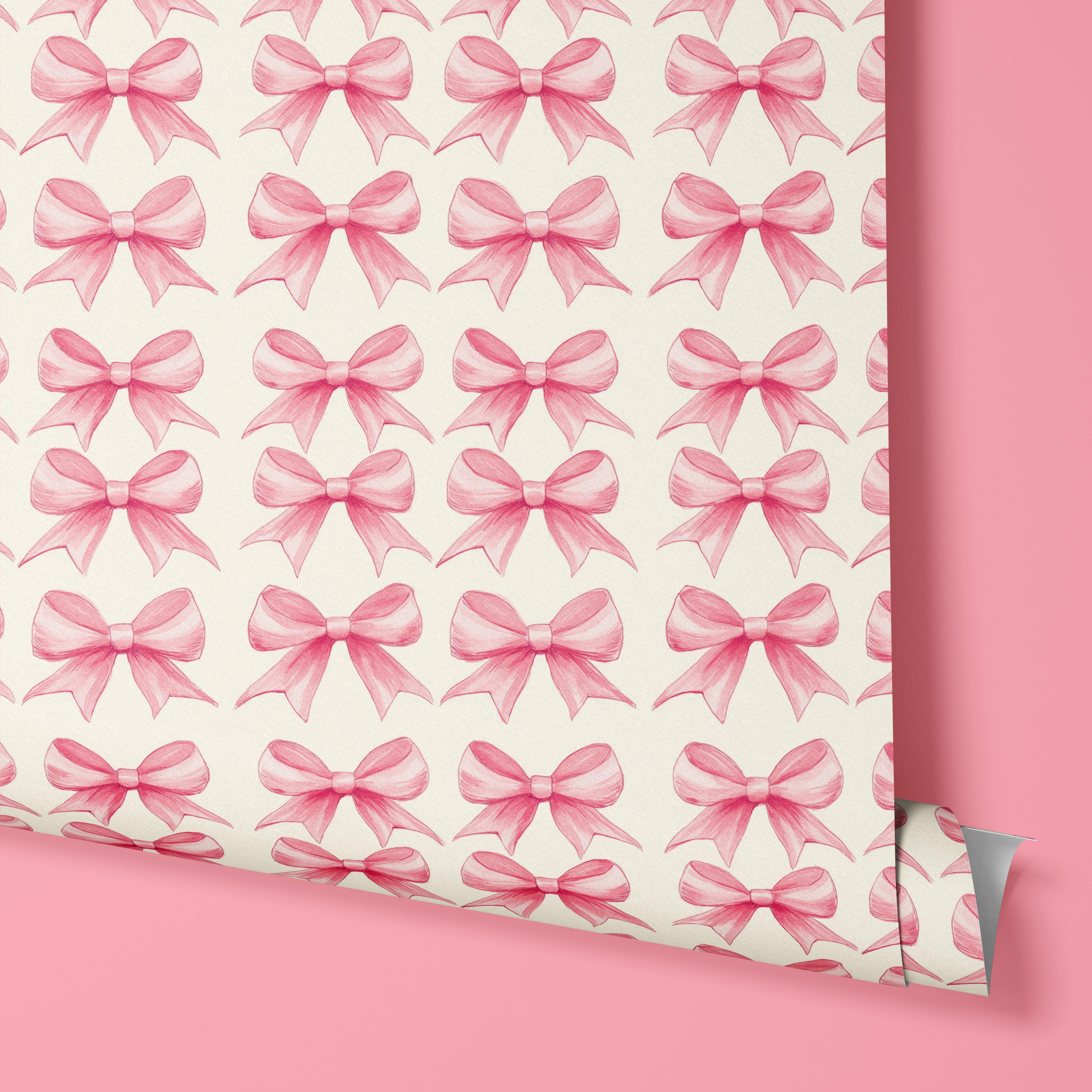 Contact Paper 1866: A roll of soft pink contact paper featuring delicate hand-drawn bows on a warm cream background, creating a whimsical and feminine aesthetic perfect for a girly space.