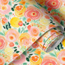 Contact 1890: A roll of watercolor floral paper featuring hand-painted pink peonies, citrus fruits, and lush green leaves on a soft cream background, perfect for a fresh and vibrant interior.