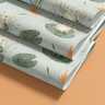 Contact Paper 1908 of green frogs on green lily pads on a light blue background.