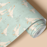 Contact paper 1909 of white geese surrounded by cattail plants on a light blue background.