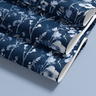 Contact Paper 1928: A deep navy blue floral paper with delicate white and light blue botanical illustrations, creating a vintage-inspired, elegant wallcovering perfect for DIY projects.