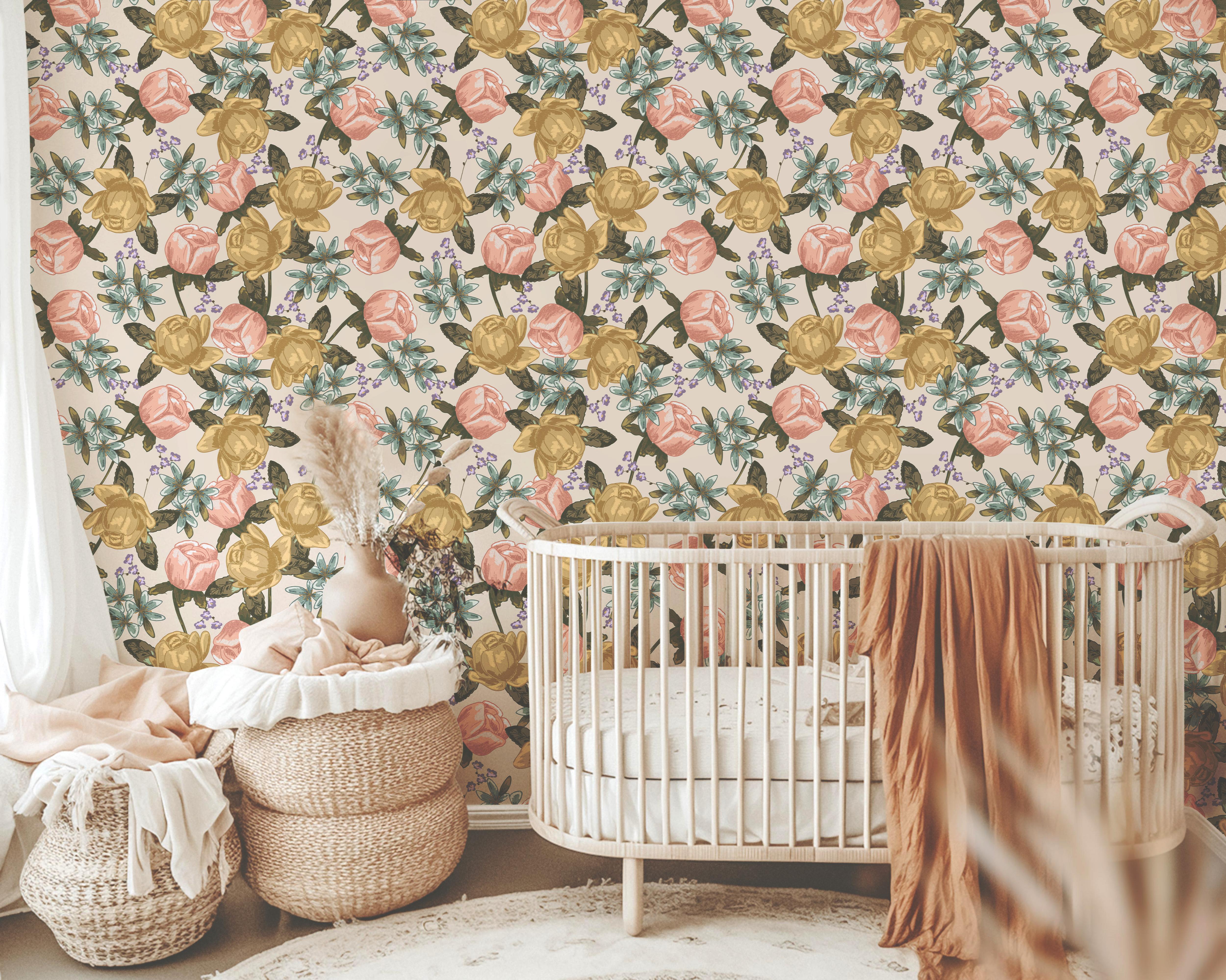 Wallpaper 1939: Wallpaper featuring a repeating floral pattern of blush pink, golden yellow, and pale teal blooms with olive green foliage on a warm cream background, styled in a neutral nursery with woven baskets and a wooden crib.