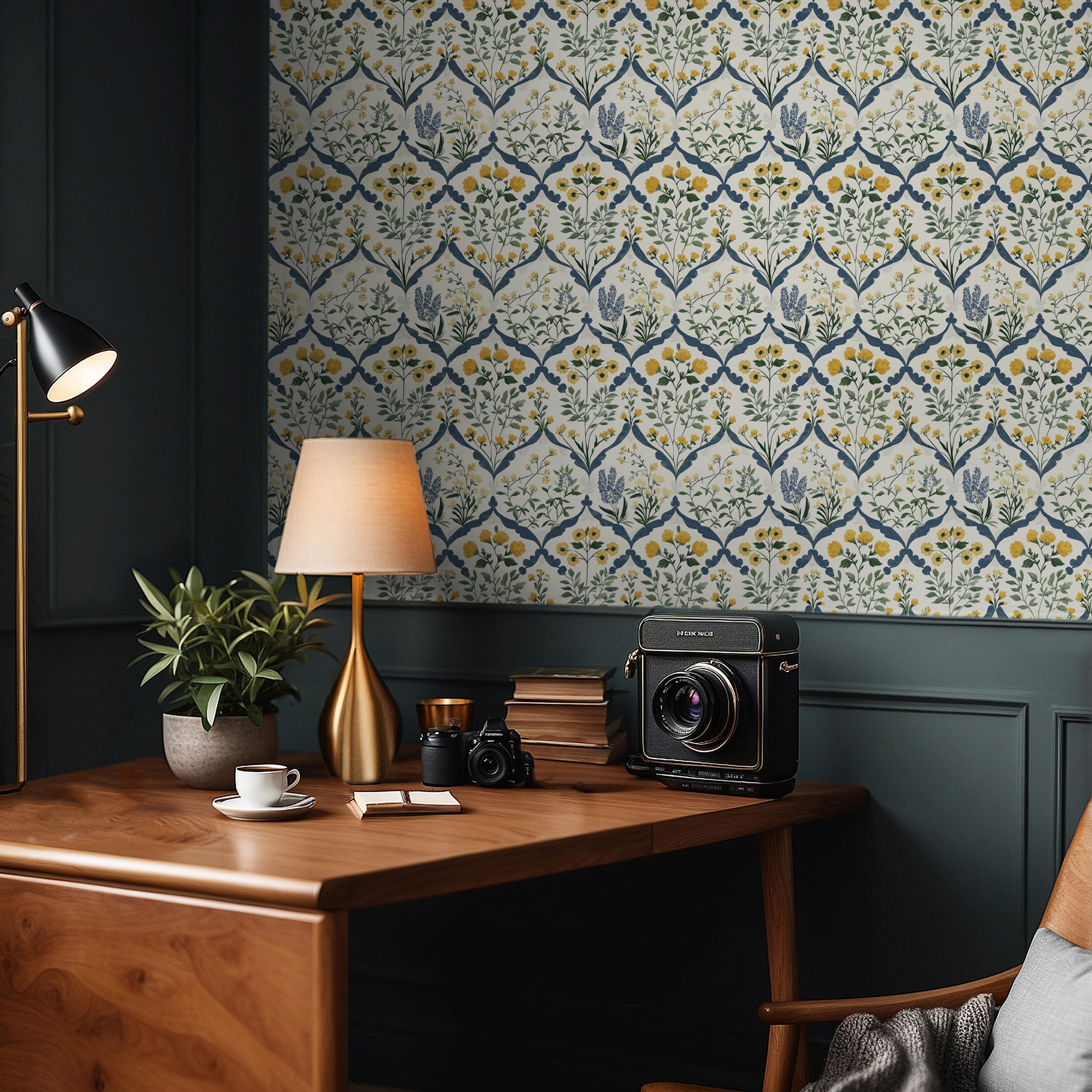 Wallpaper 1966: Repeating damask-style wallpaper with yellow and blue flowers framed in a diamond pattern, shown in a cozy study with wood furniture and dark green paneling.