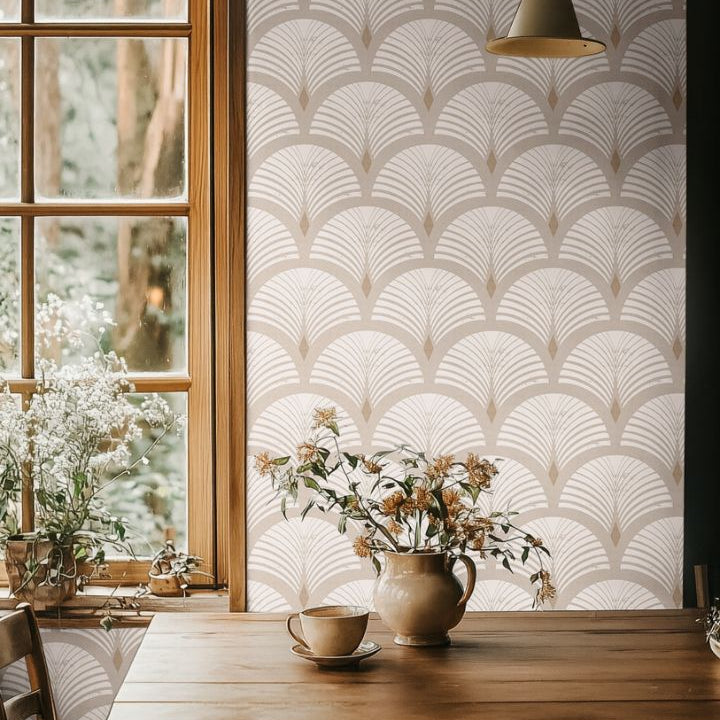 Sandcroft wallpaper in an organic modern dining space featuring warm beige geometric fan motifs