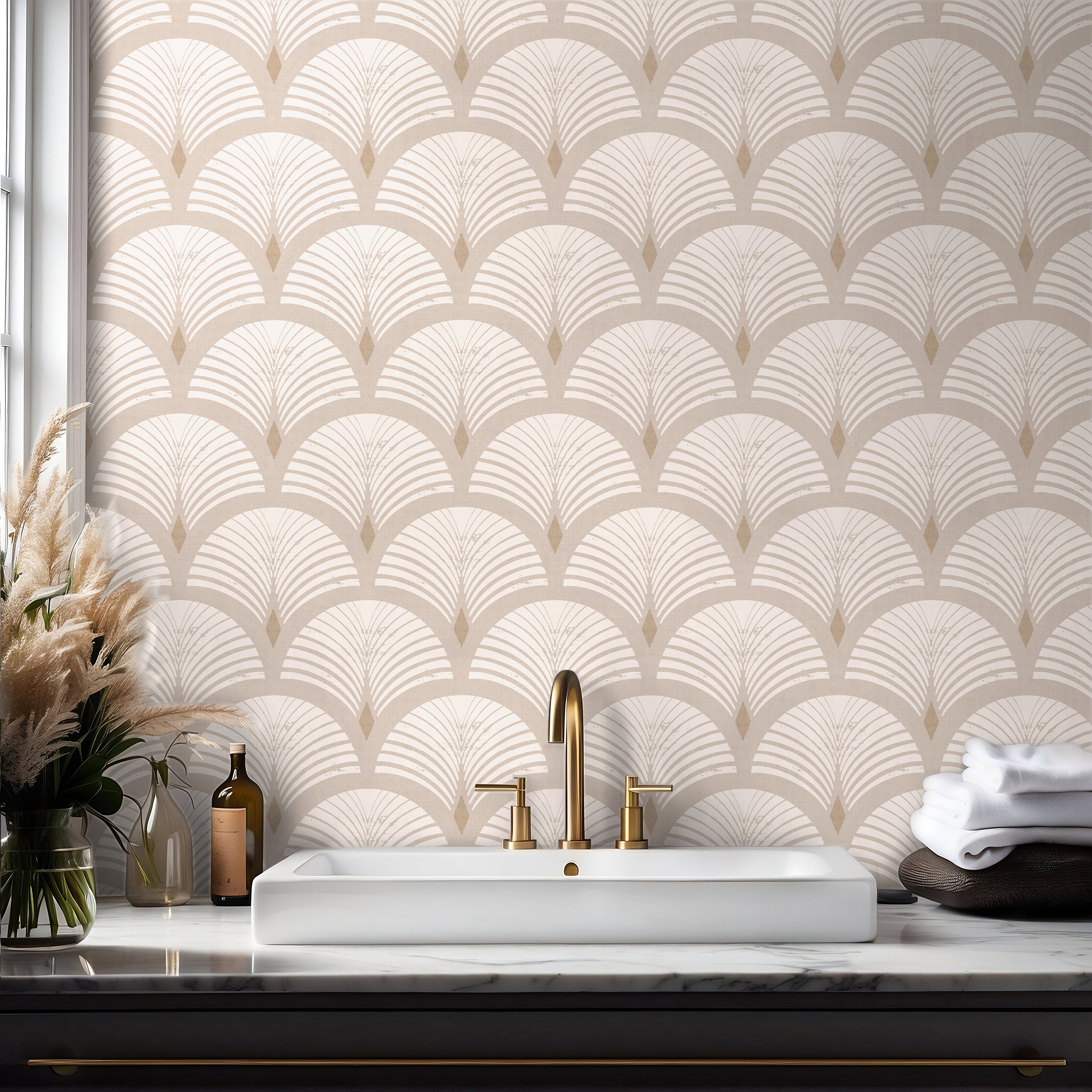 Close-up of Sandcroft wallpaper featuring a distressed Art Deco fan motif in neutral beige and ivory tones.