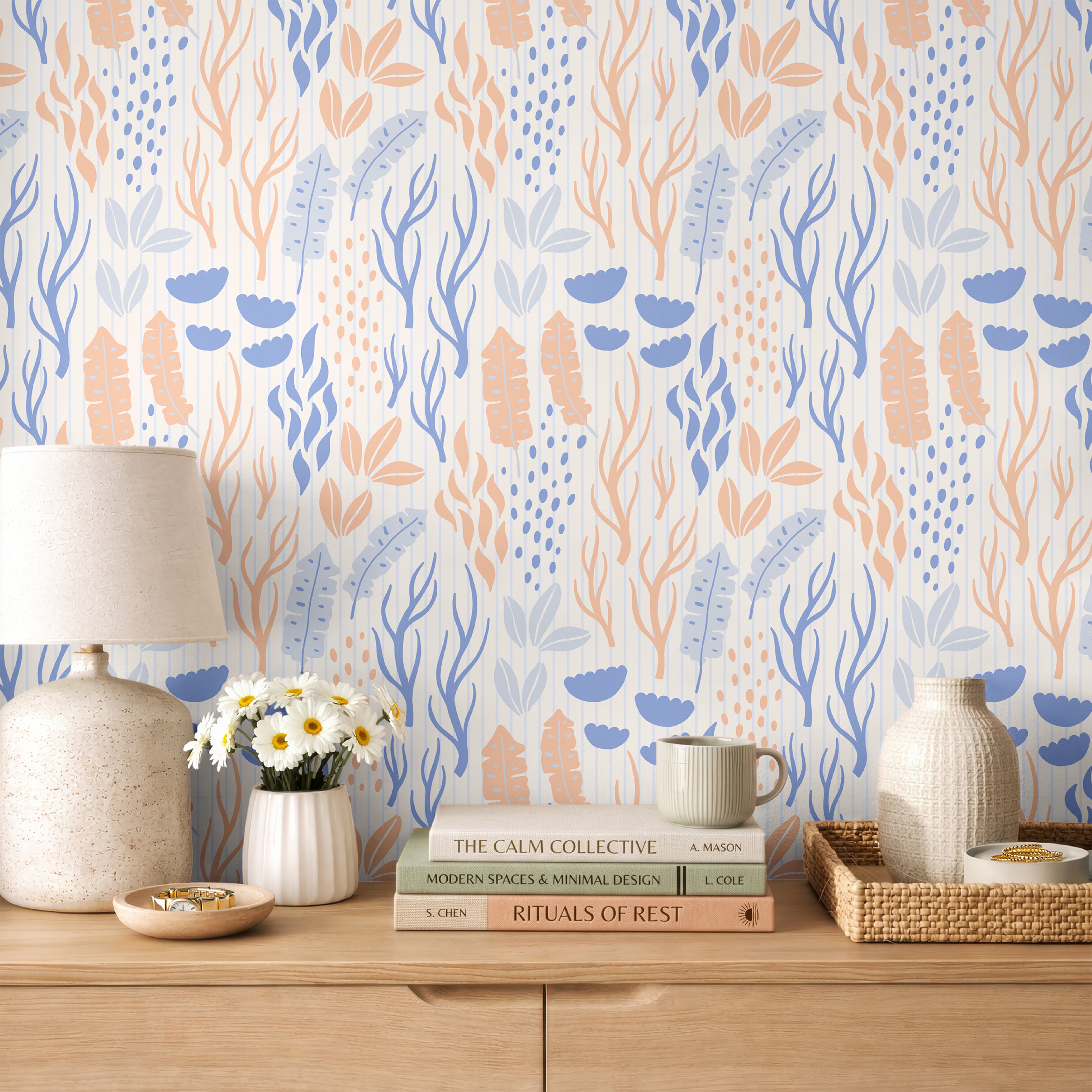Modern coastal wallpaper with abstract sea grass and coral inspired botanical design in calming blue and peach tones.