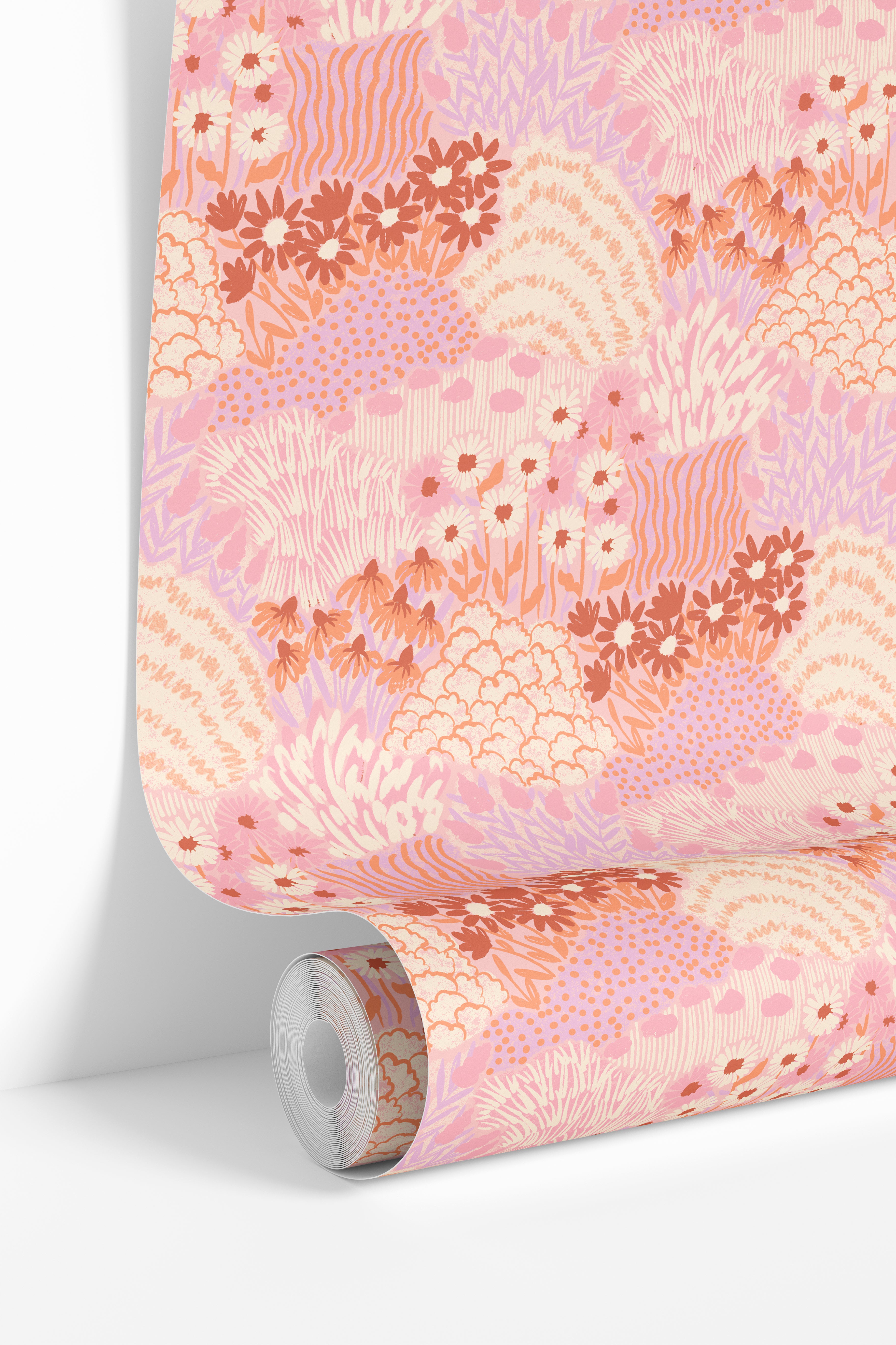 Flowers in Her Hair floral wallpaper installed as a feature wall in a bright feminine interior.