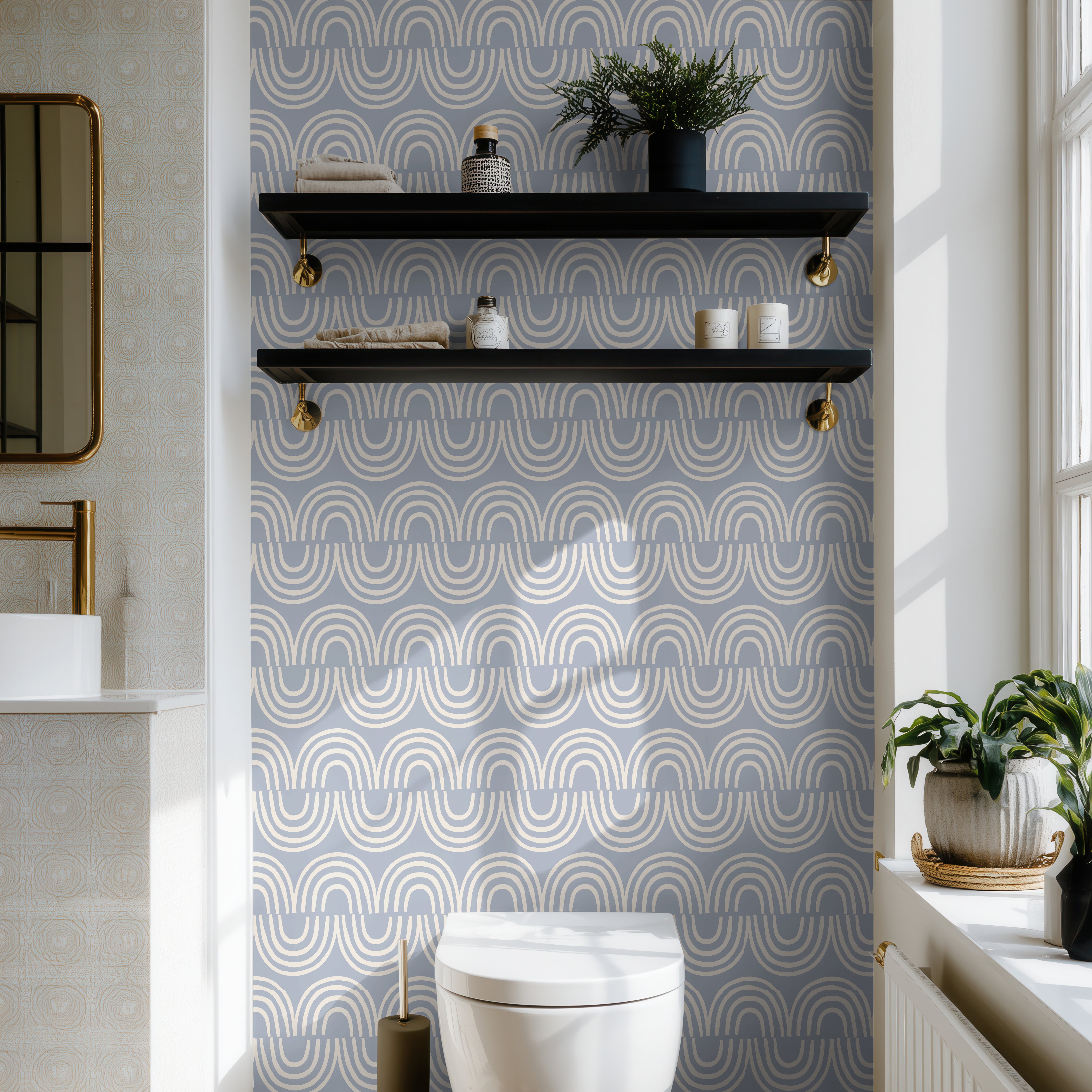 Harbor & Sky geometric wallpaper in a modern bathroom with blue arch pattern and warm neutral décor.
