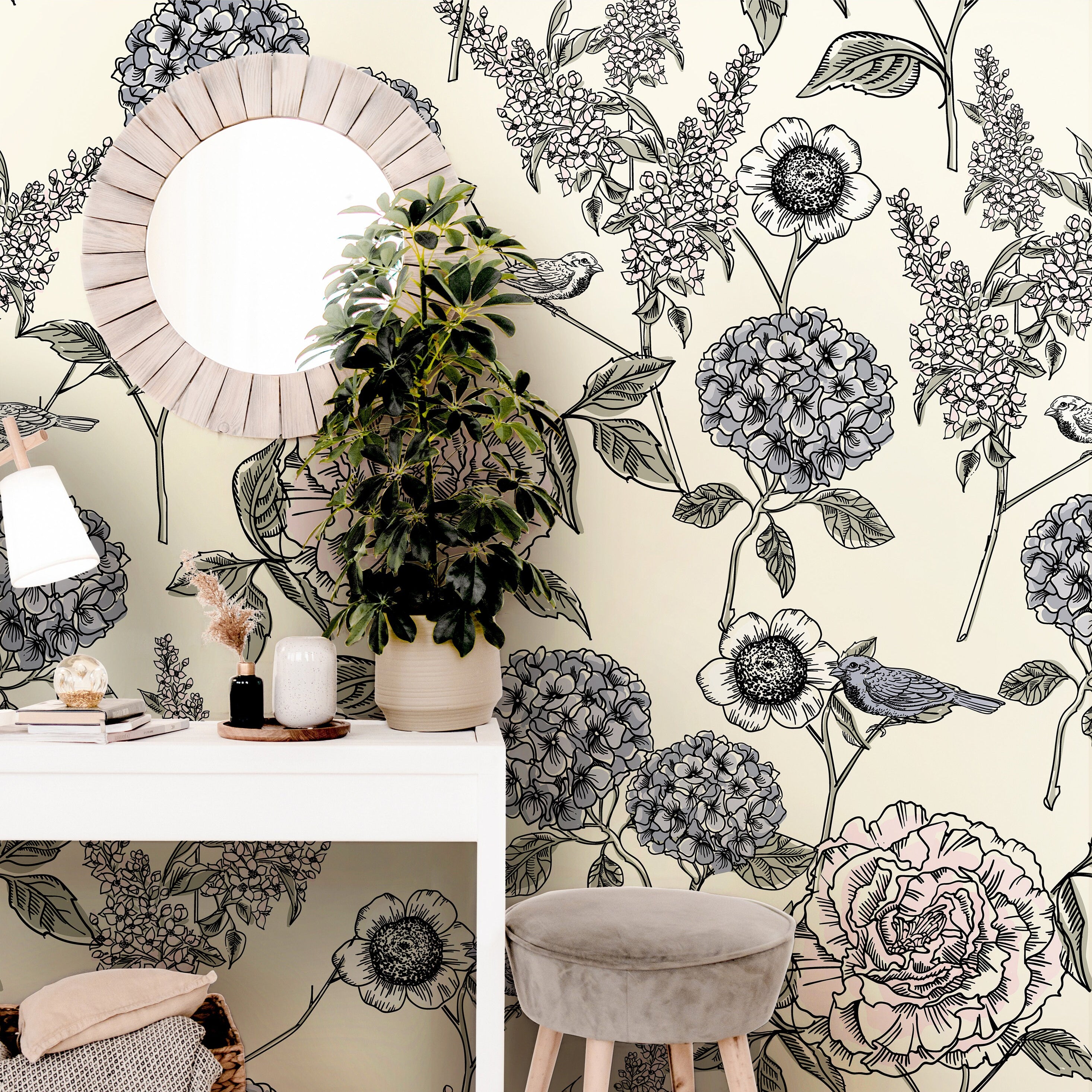 The Gardener's Journal botanical wallpaper styled in an entryway with a round wood mirror and neutral furniture.