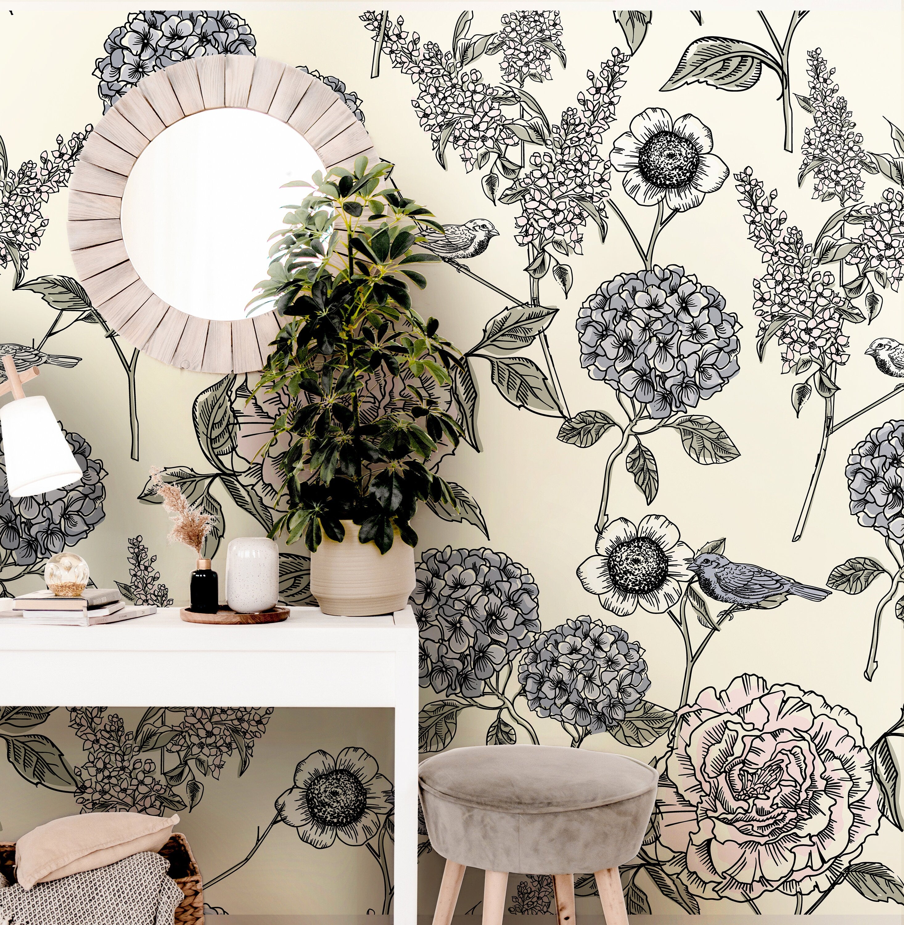 The Gardener's Journal botanical wallpaper styled in an entryway with a round wood mirror and neutral furniture.