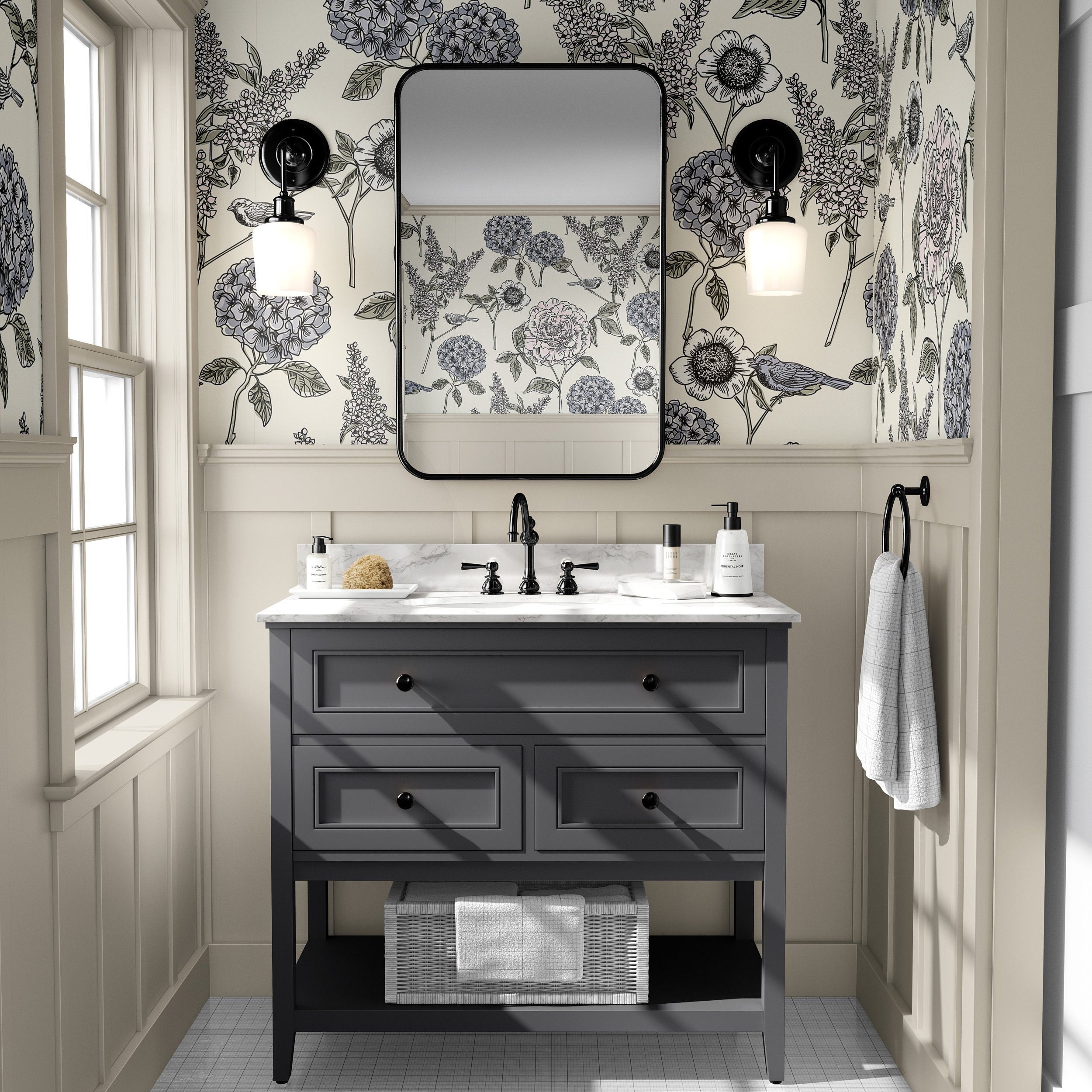 The Gardener's Journal blue hydrangea wallpaper above white paneling in a bright powder room with black accents.
