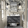 The Gardener's Journal blue hydrangea wallpaper above white paneling in a bright powder room with black accents.