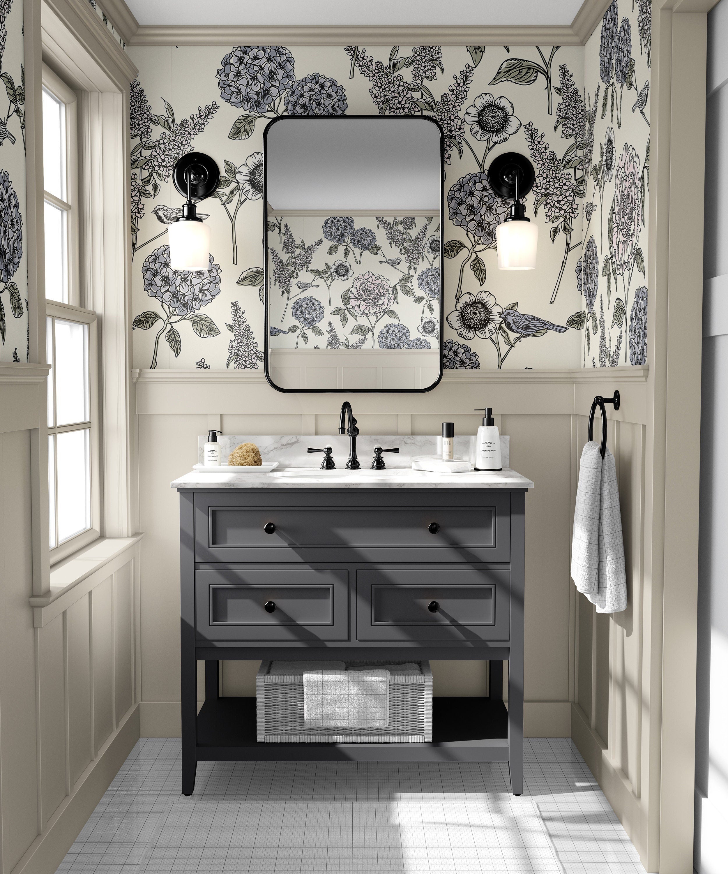 The Gardener's Journal blue hydrangea wallpaper above white paneling in a bright powder room with black accents.