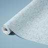 Contact paper 873: "A soothing contact paper featuring hand-drawn abstract waves in soft blue tones, creating a flowing, nautical-inspired aesthetic. Perfect for adding a tranquil, coastal feel to walls, furniture, or accent décor.