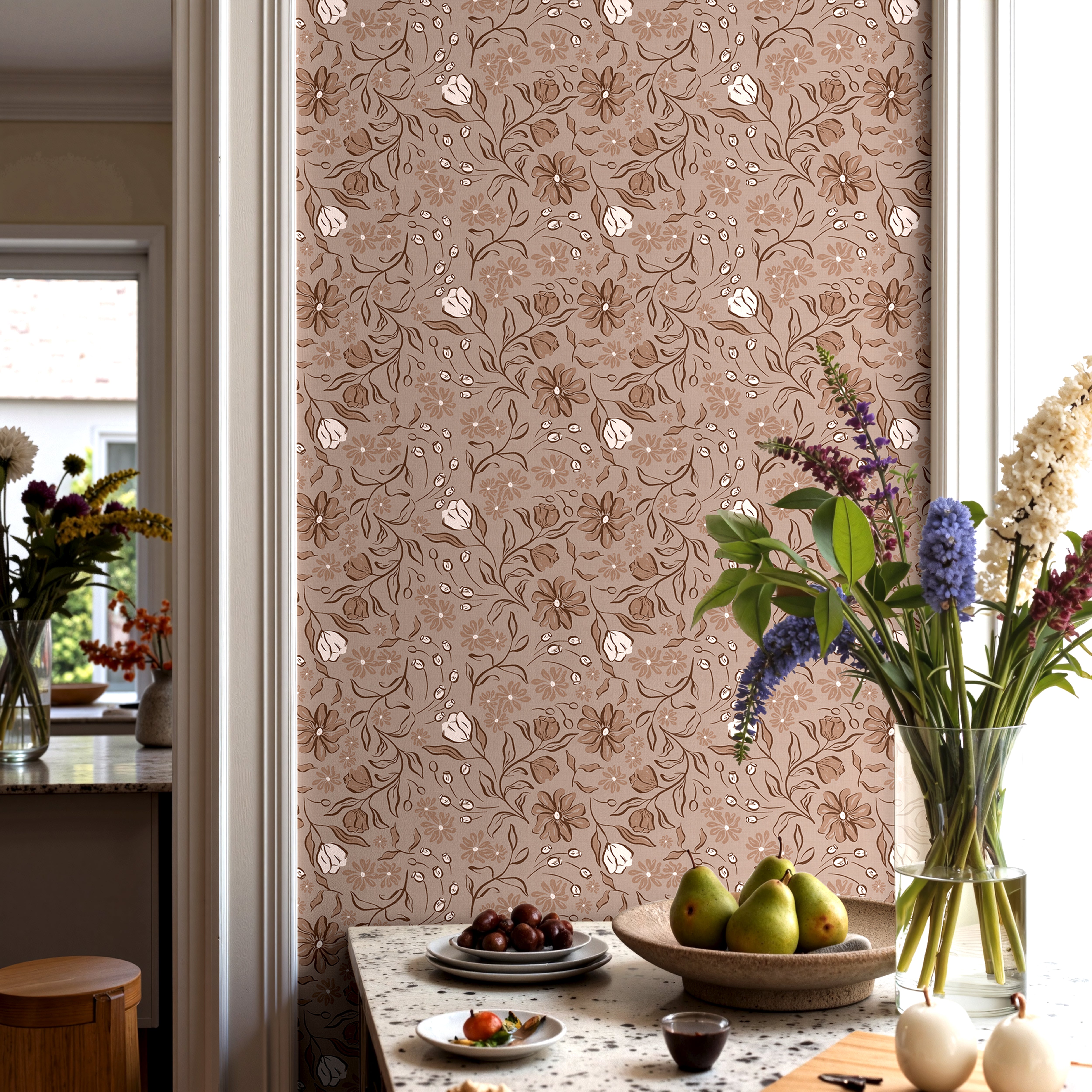 Barleymont wallpaper featuring earthy taupe and wheat-beige tones in a softly textured pattern installed in a modern kitchen/dining interior