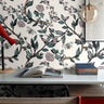 Bees and branches with green leaves and pink flowers on a cream background in boys room with desk