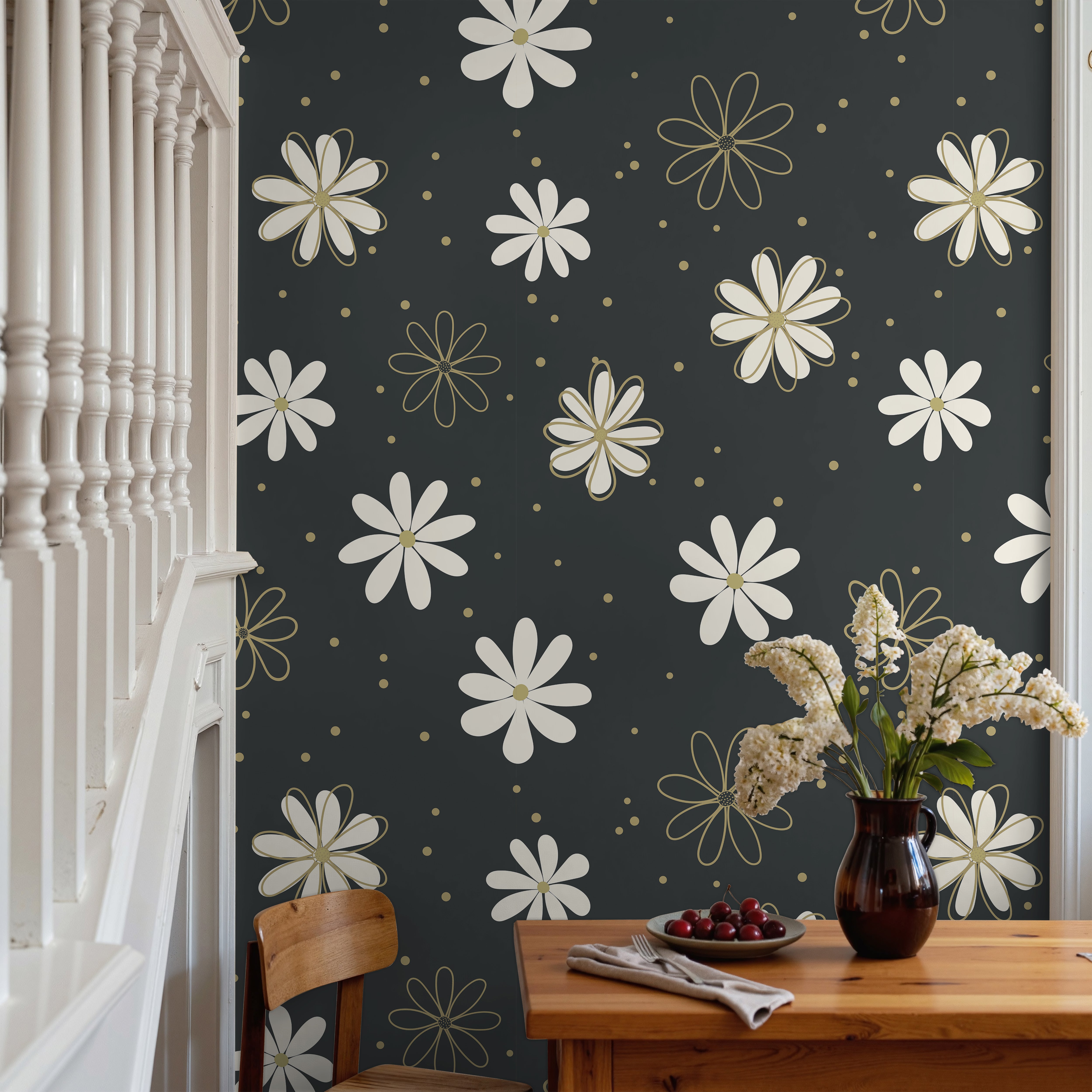 Black and white daisies with golden accents on black background in living space