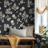 Black and white florals with yellow accents in bright interior reading nook