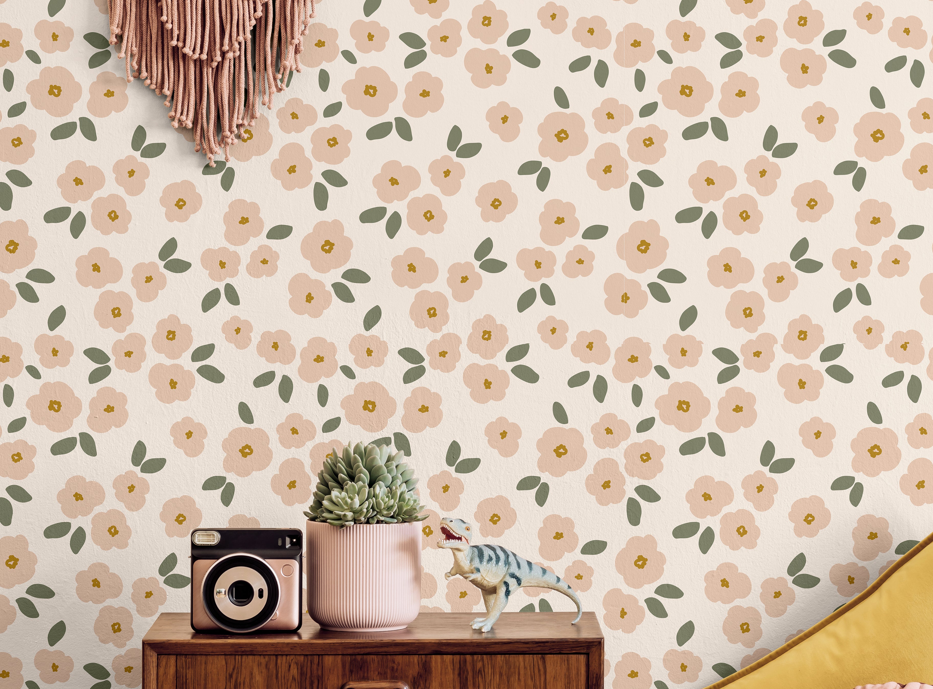 Pink flowers on cream background in kids boho bedroom