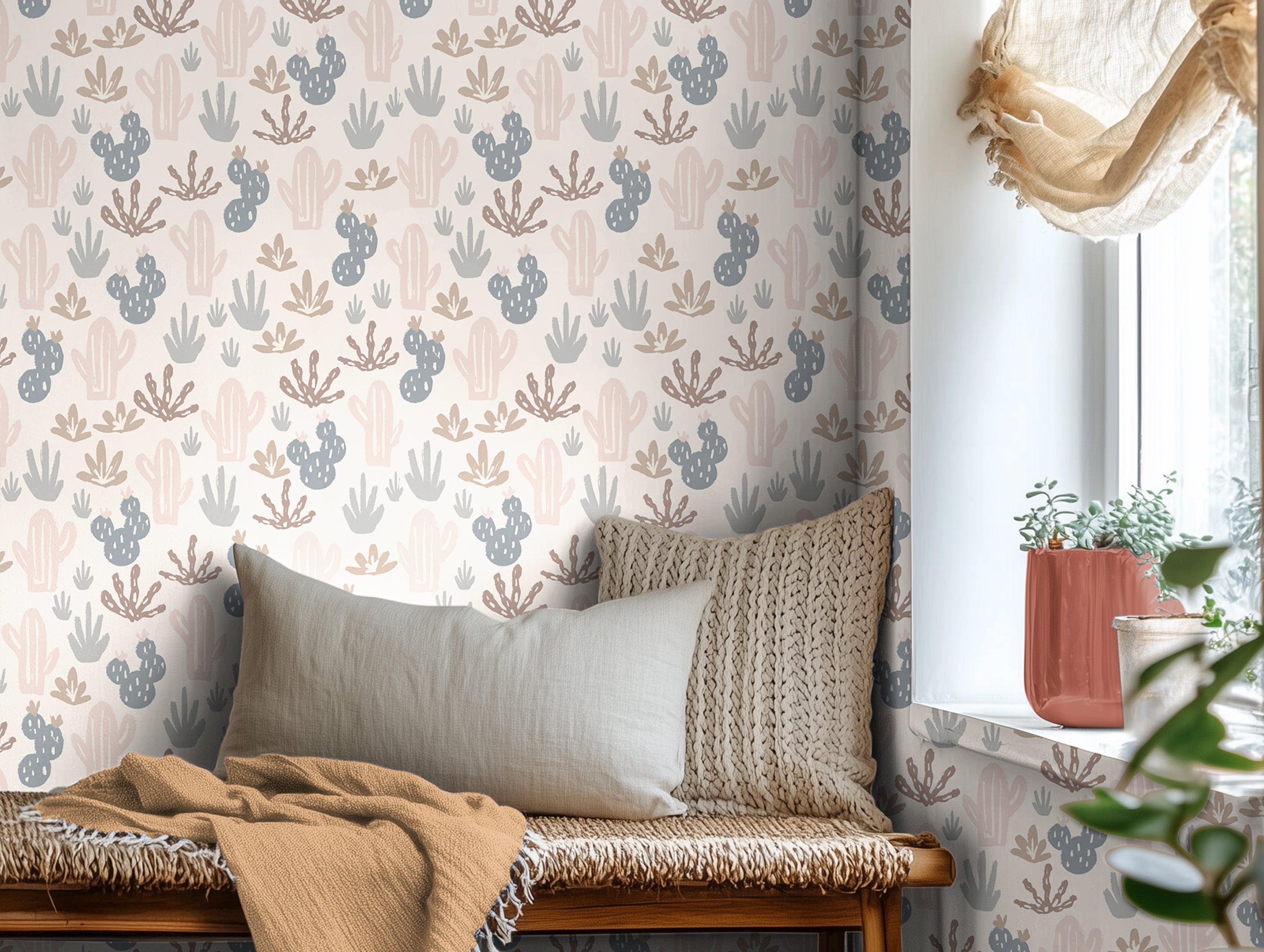 Blue orange and pink muted boho cacti with warm day bed