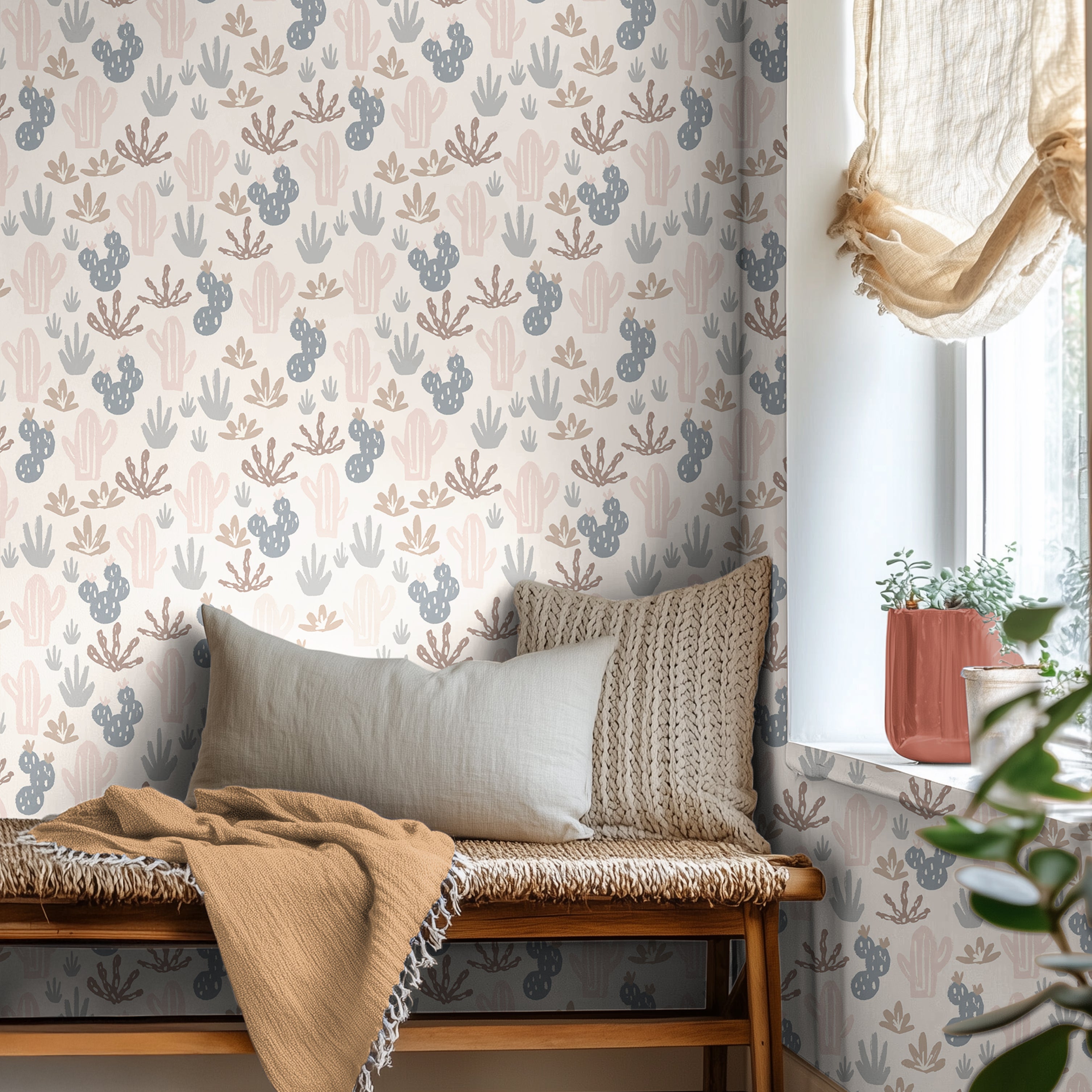 Blue orange and pink muted boho cacti with warm day bed