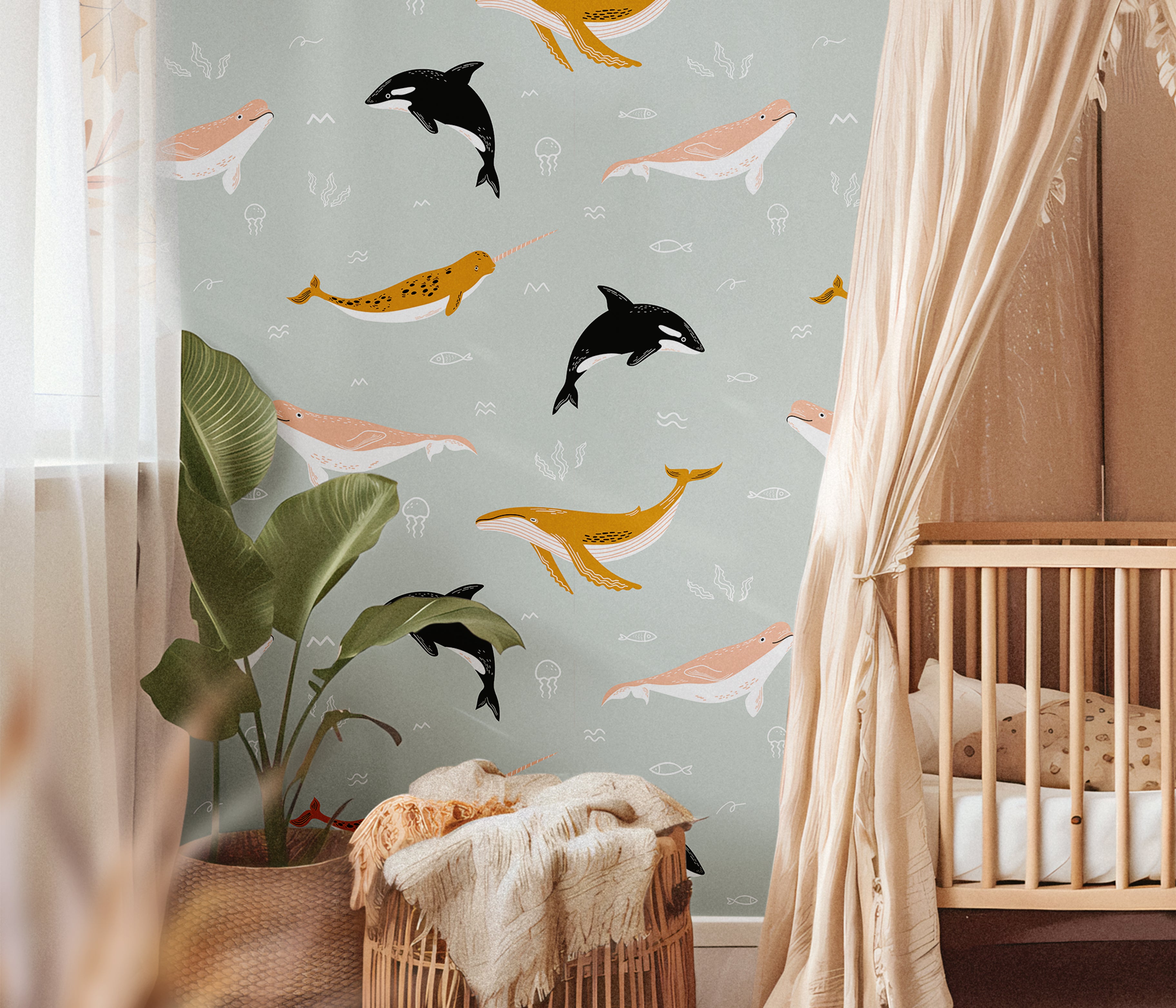 Whales in boho colors styled in a beige themed nursery