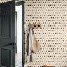 muted boho colored triangles in inviting entryway