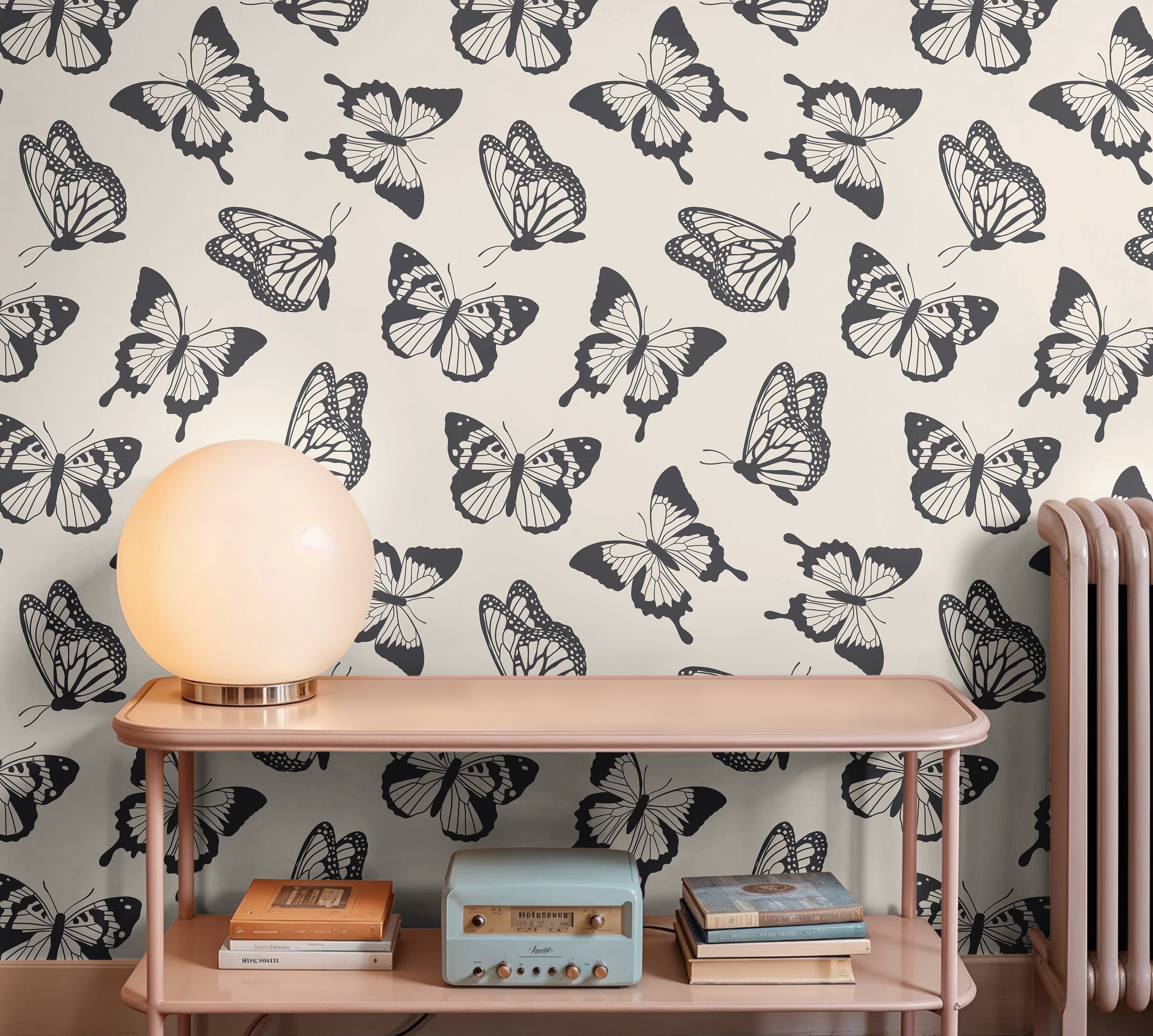 Black butterflies on cream background in mid-century modern interior