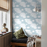 Storming clouds on blue background in teens bedroom