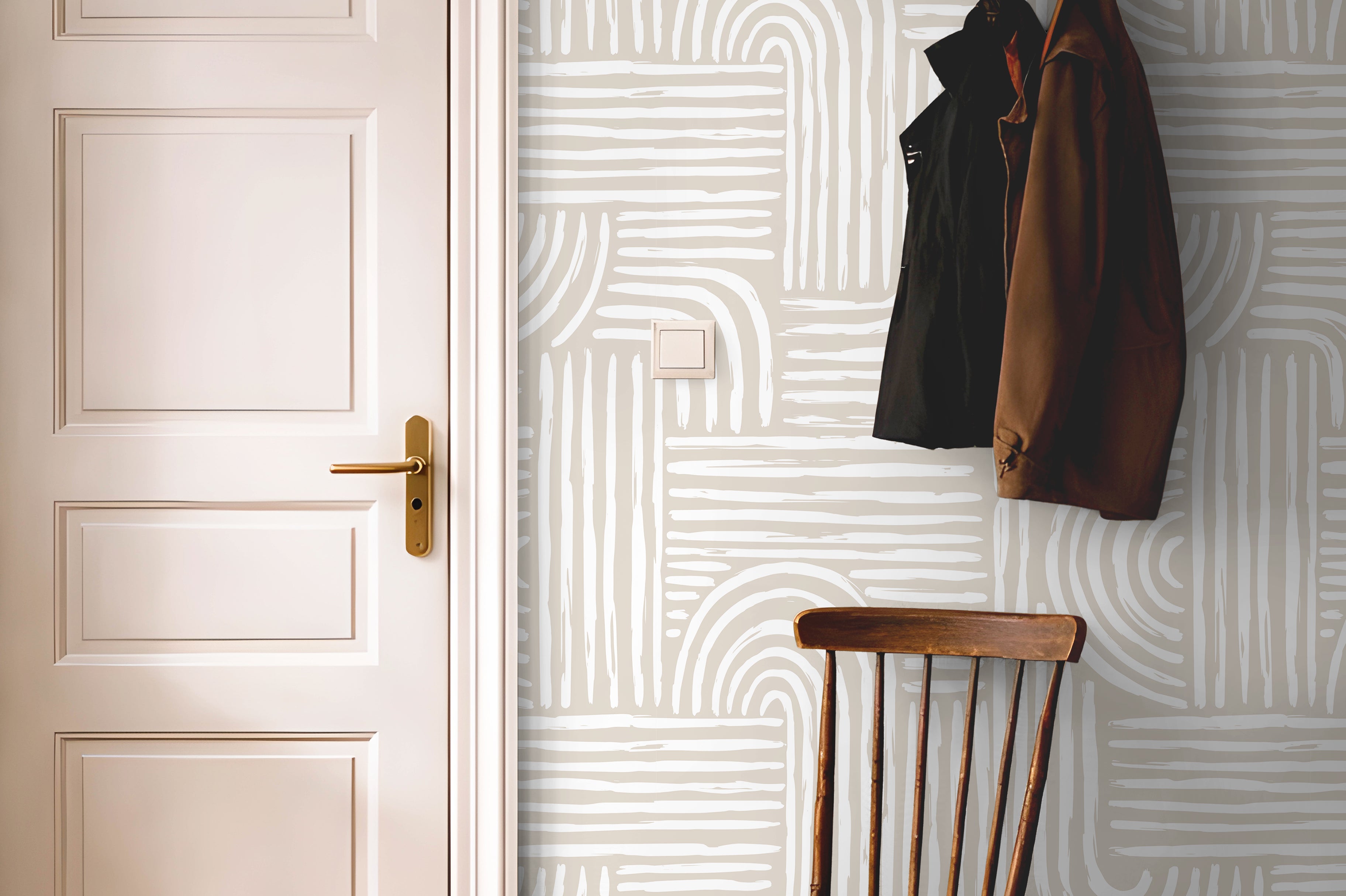 Cream and white art deco lined wallcovering in bright hallway with warm wooden accents
