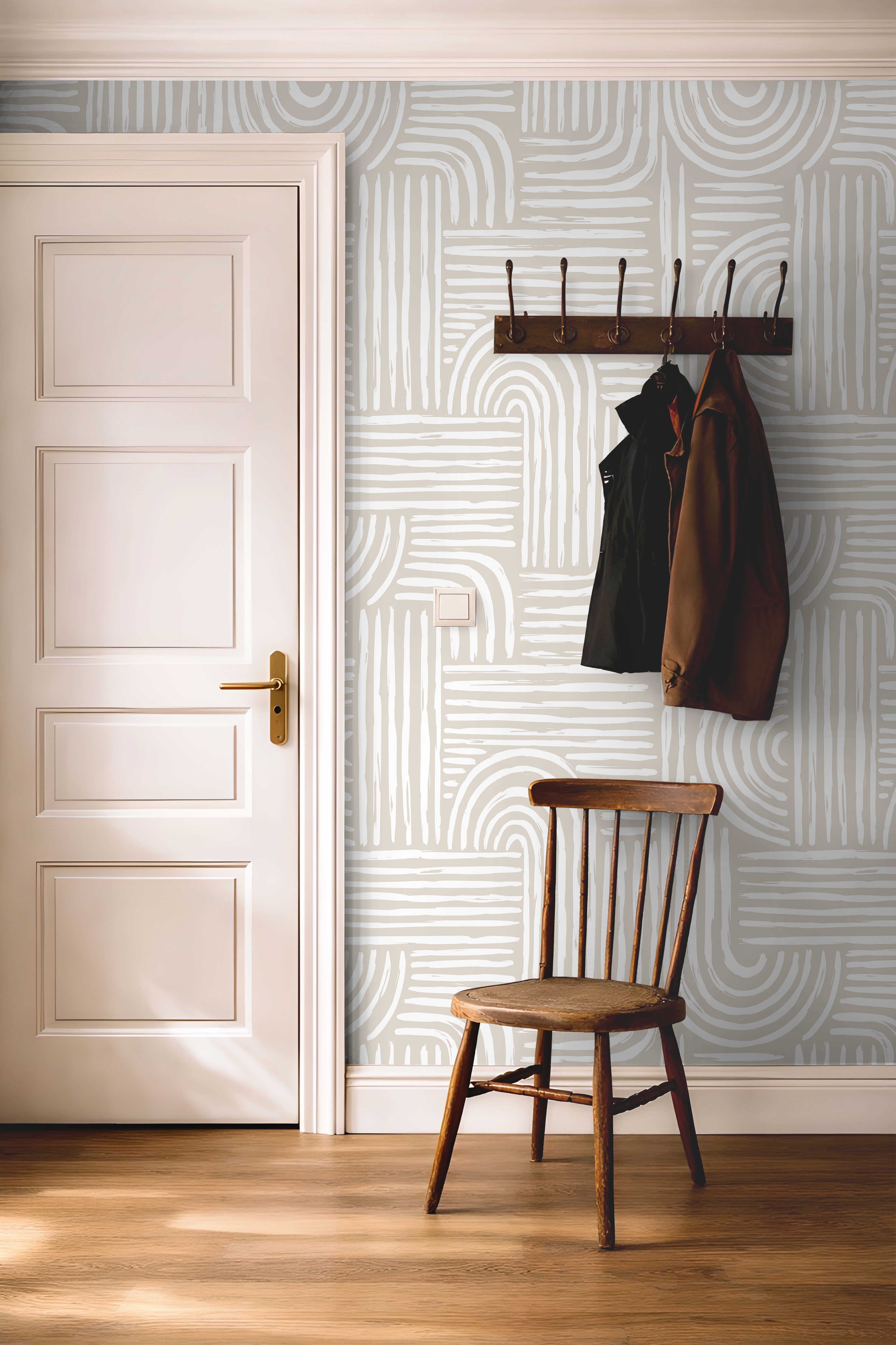 Cream and white art deco lined wallcovering in bright hallway with warm wooden accents