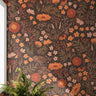 Wallpaper 720: Wallpaper featuring hand-drawn blush pink and terracotta wildflowers with warm beige leaves on a soft cream background, styled in a cozy room with natural light and wood furnishings.

