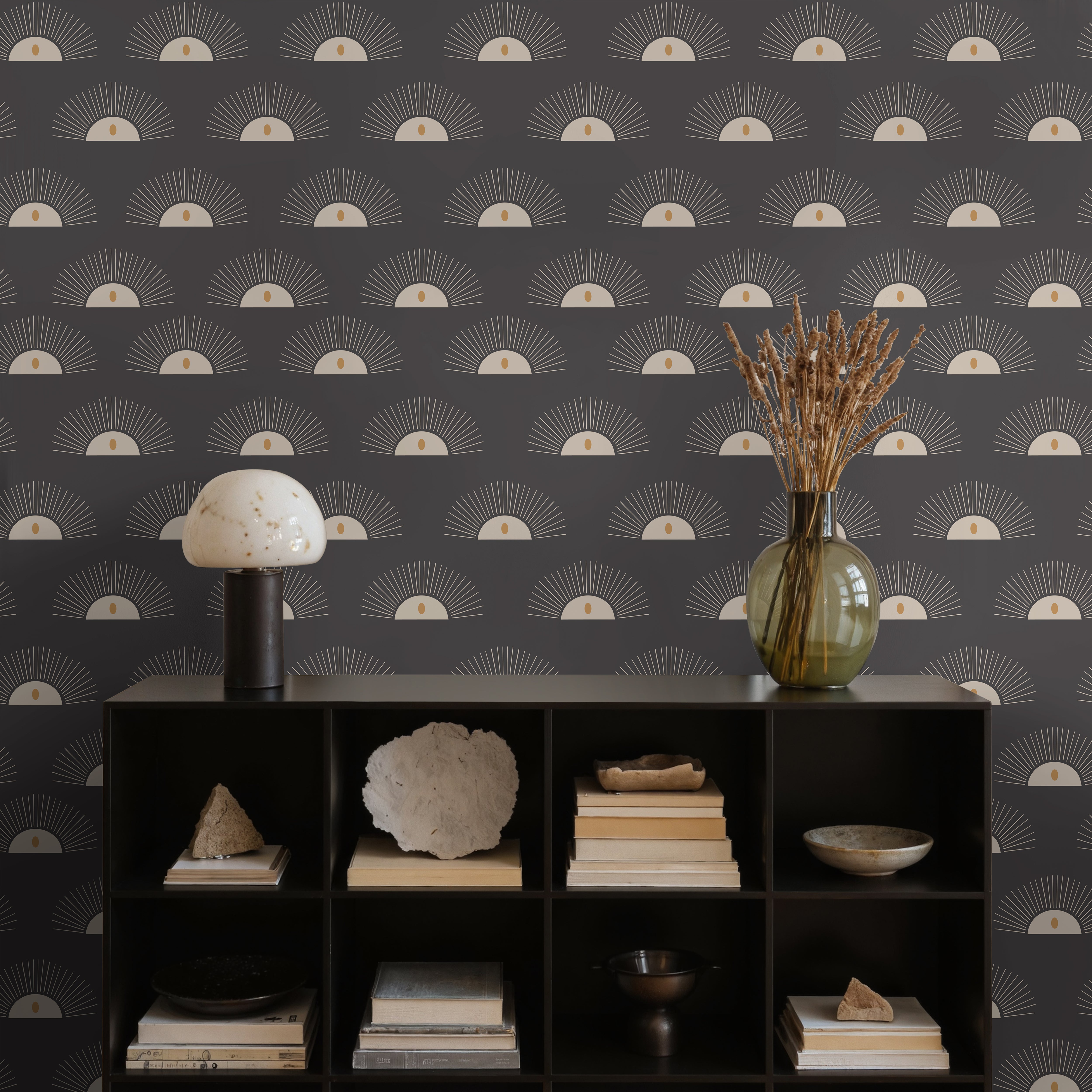 Golden suns peaking from the horizon with rays on dark charcoal background styled in modern living room interior