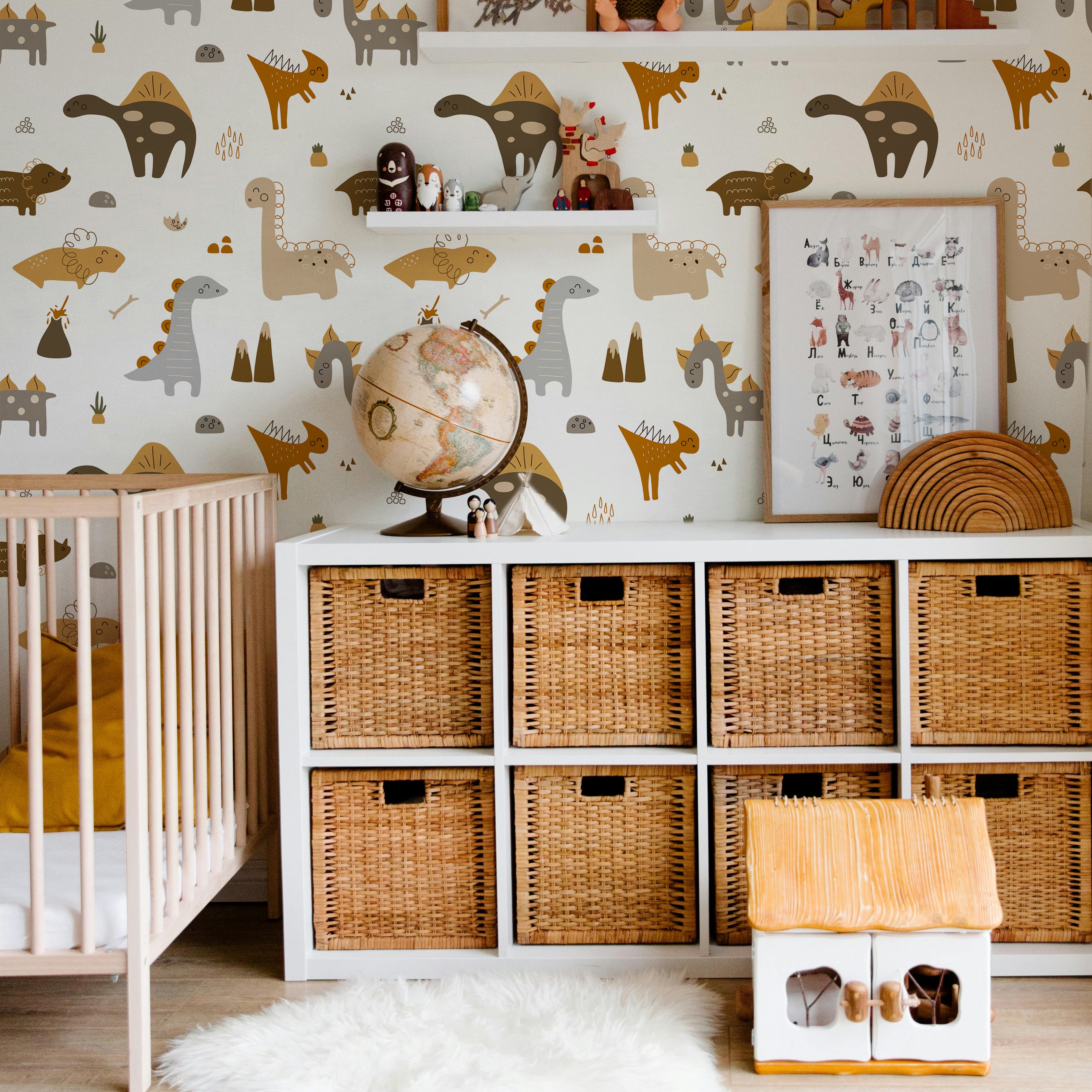 boho brown dinosaurs with mountains and volcanos and bones in kids nursery play room with cube shelf and wicker baskets 