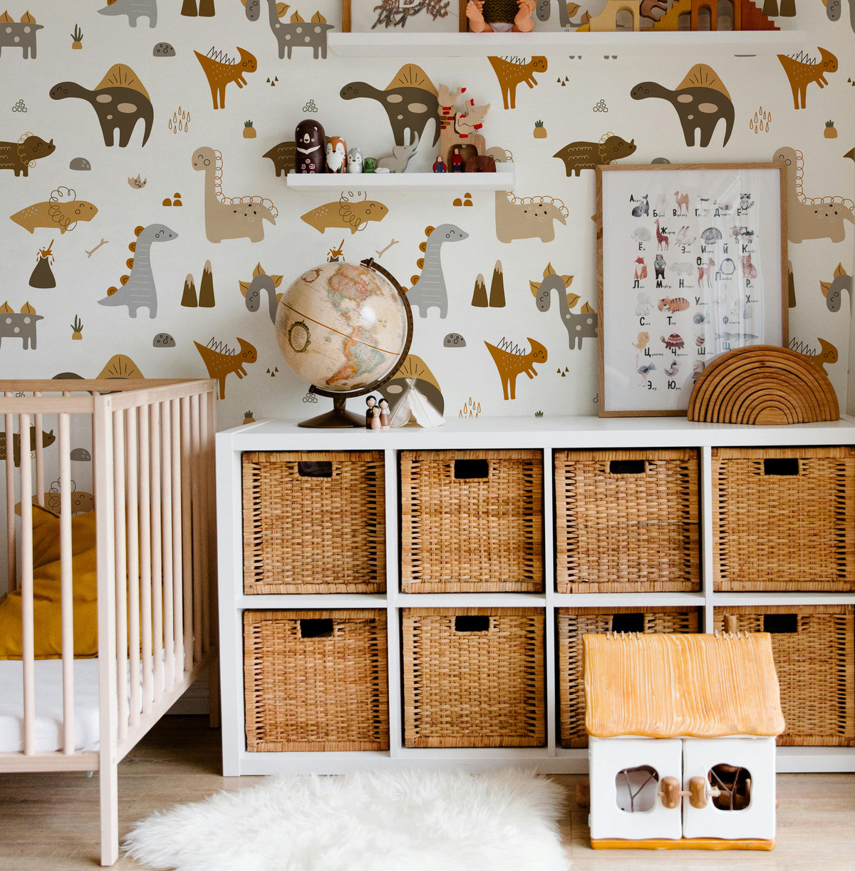 boho brown dinosaurs with mountains and volcanos and bones in kids nursery play room with cube shelf and wicker baskets 