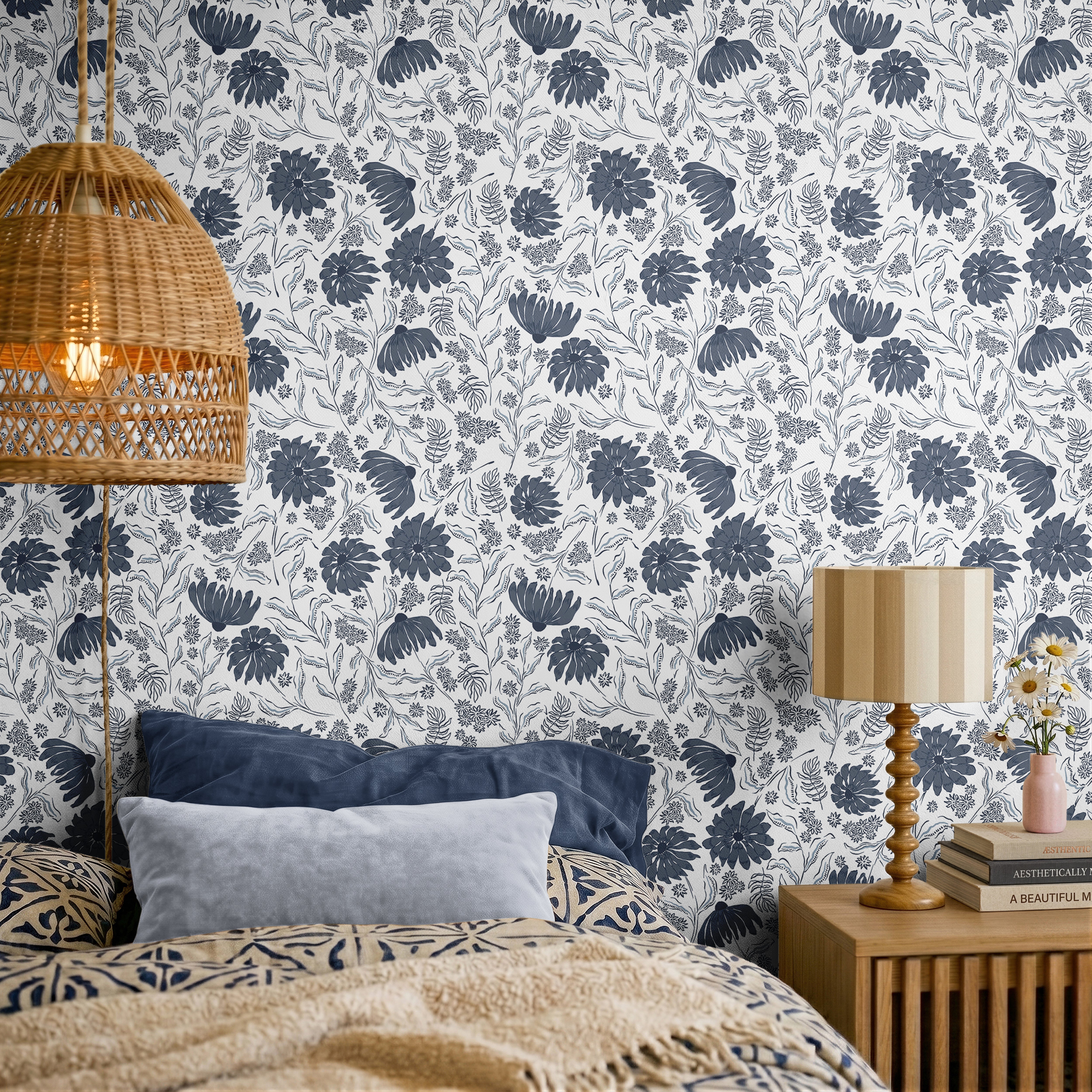classic floral wallpaper in deep navy set against a soft cream background