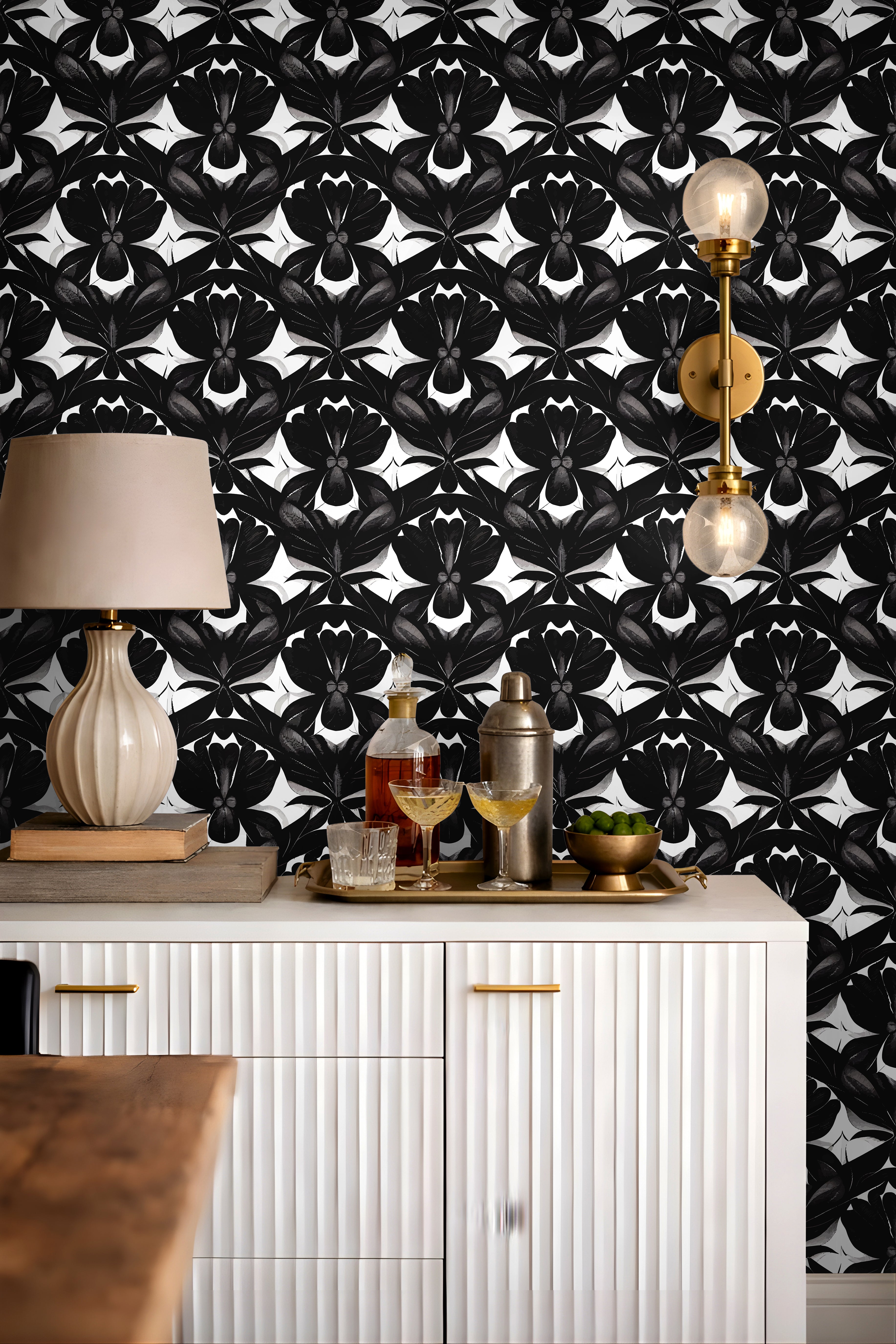 Black and white Geometric florals that look like skulls behind modern day bar credenza
