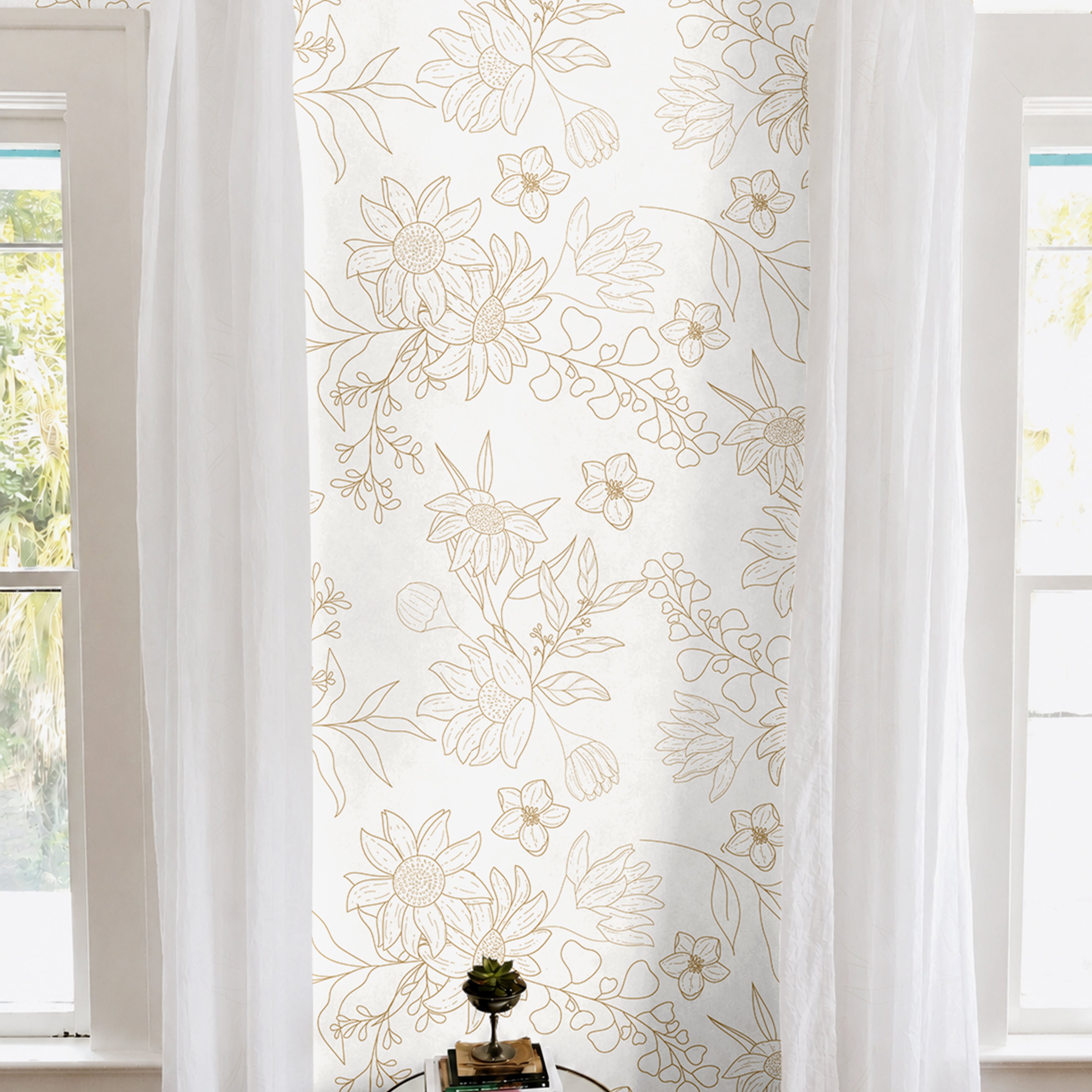 Drawn golden floral outlines in bright white living room