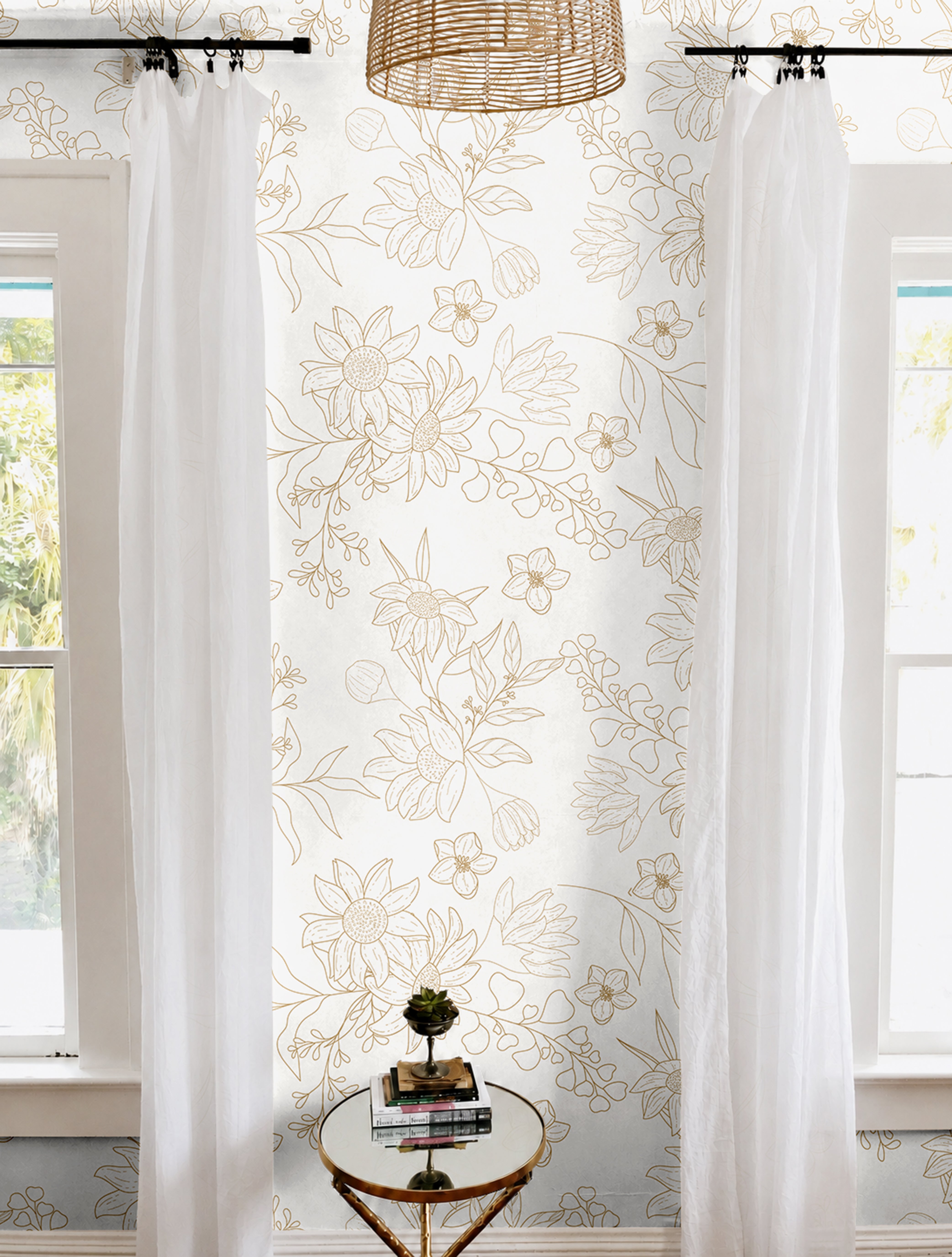 Drawn golden floral outlines in bright white living room