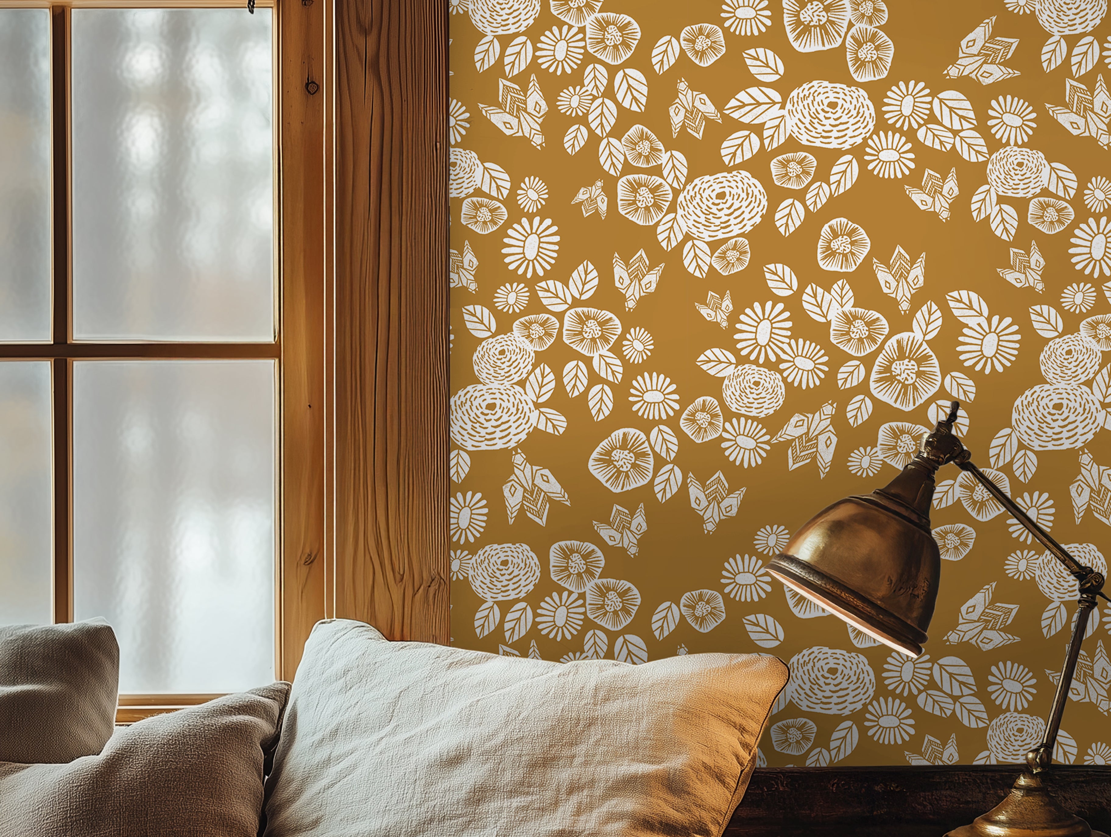 White florals with golden background styled in cozy interior 